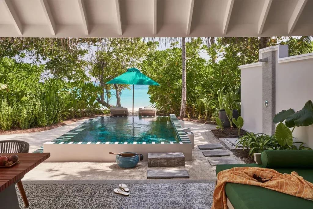 Beach Pool Villa pool terrace at Finolhu Maldives