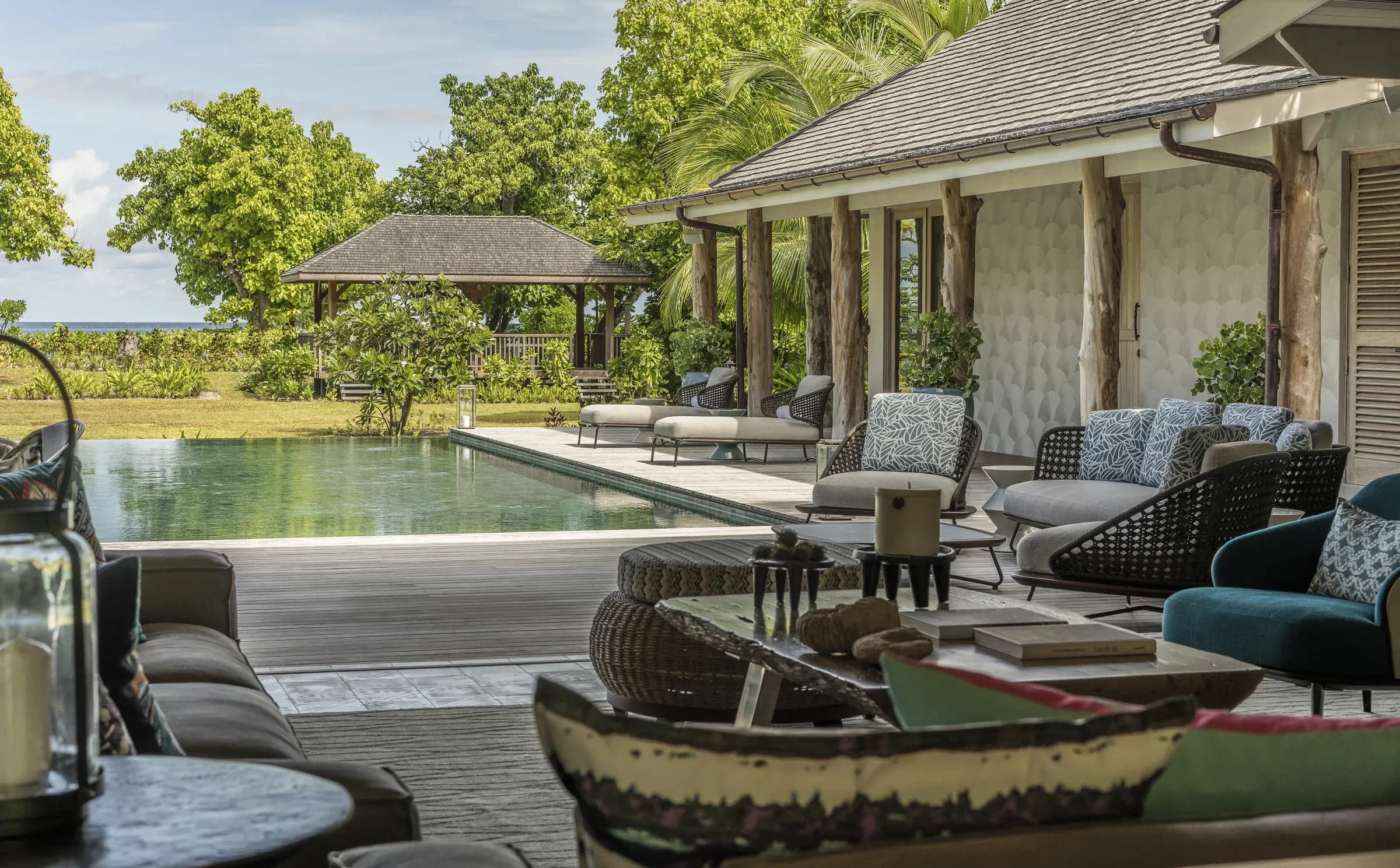 Five-Bedroom Presidential Villa pool and garden at Four Seasons Resort Seychelles at Desroches Island