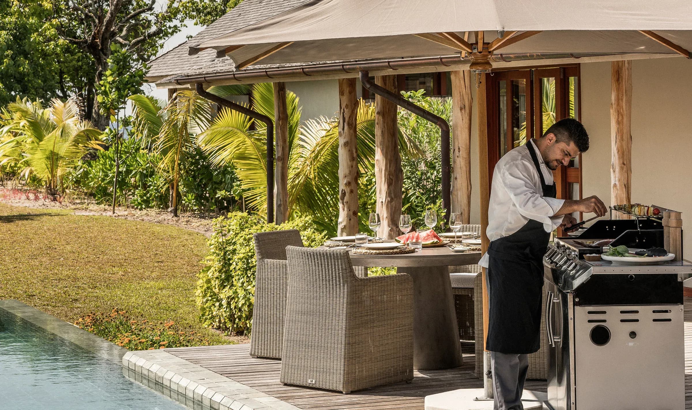 Five-Bedroom Residence Villa pool deck at Four Seasons Resort Seychelles at Desroches Island