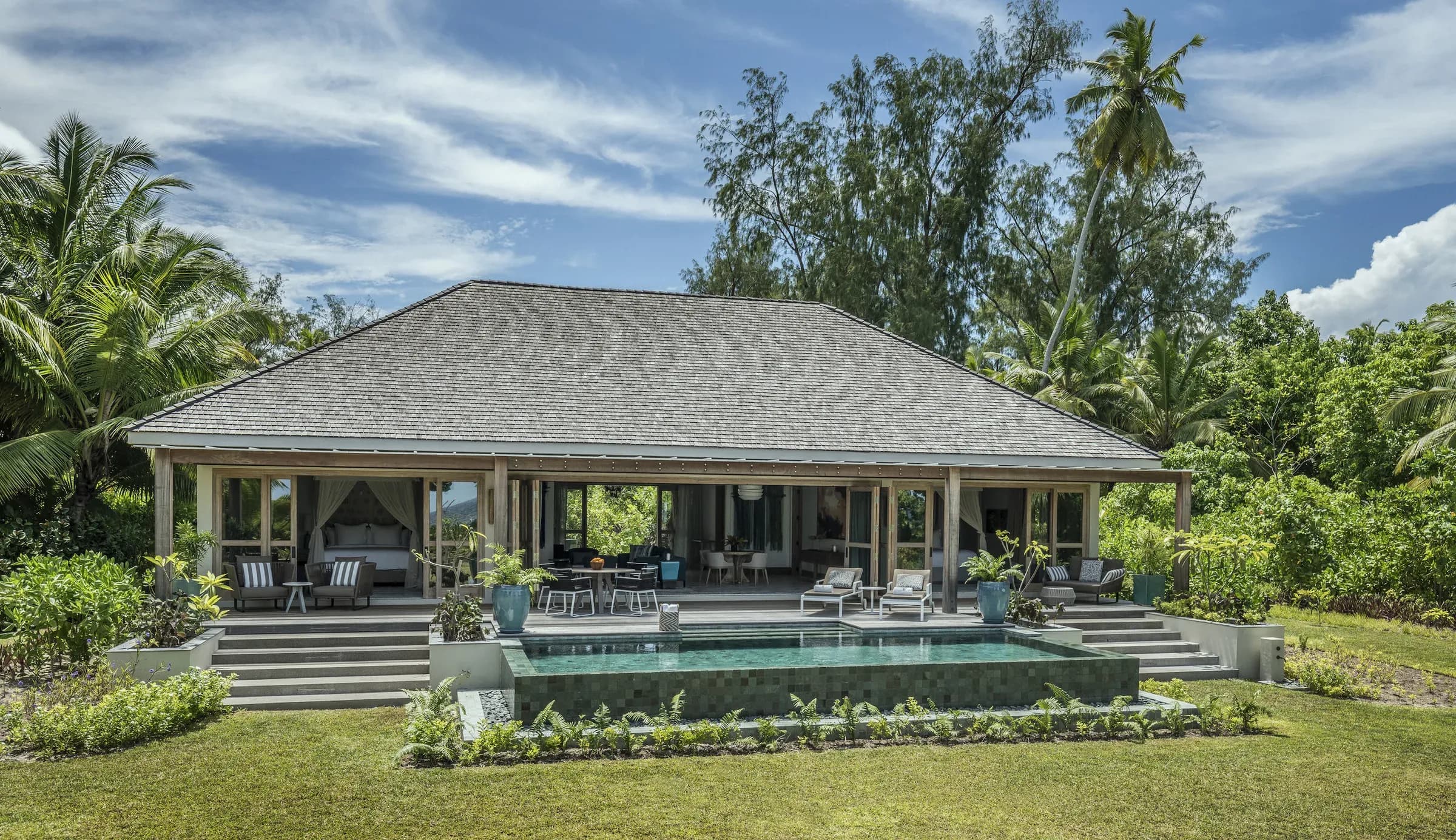 Two-Bedroom Presidential Villa pool deck at Four Seasons Resort Seychelles at Desroches Island