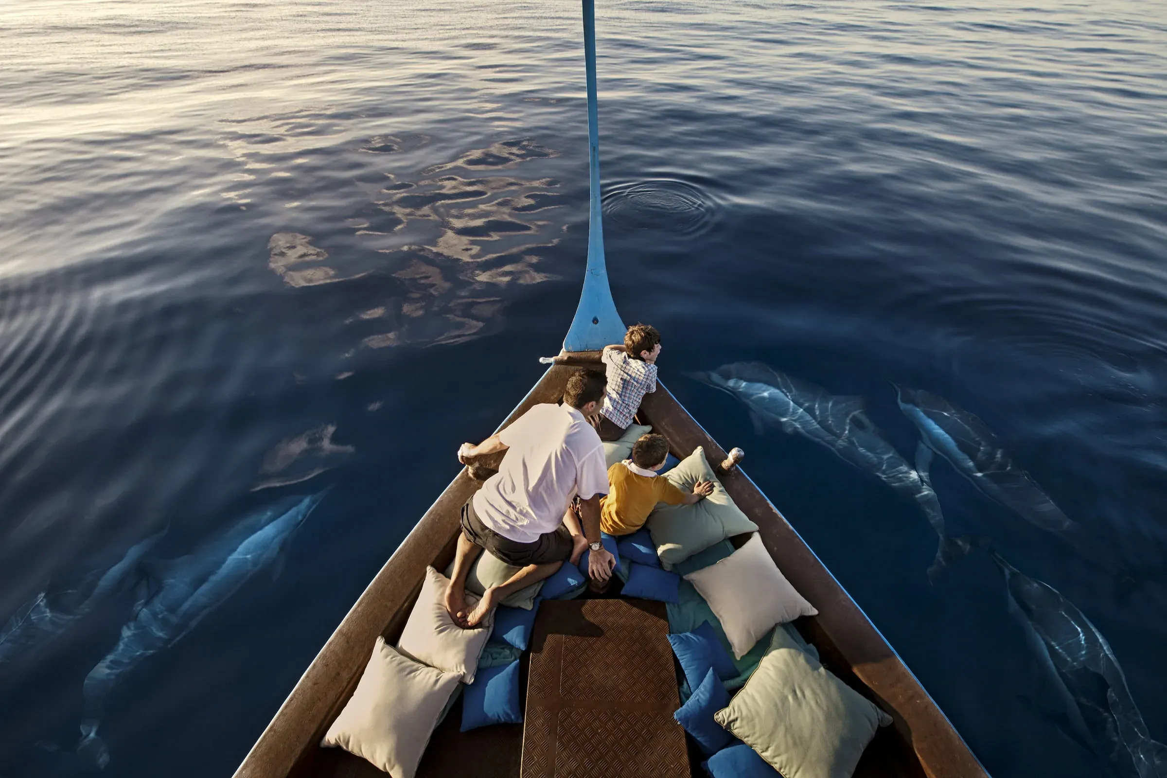 Traditional dhoni boat excursion with dolphins near Four Seasons Resort Maldives at Kuda Huraa