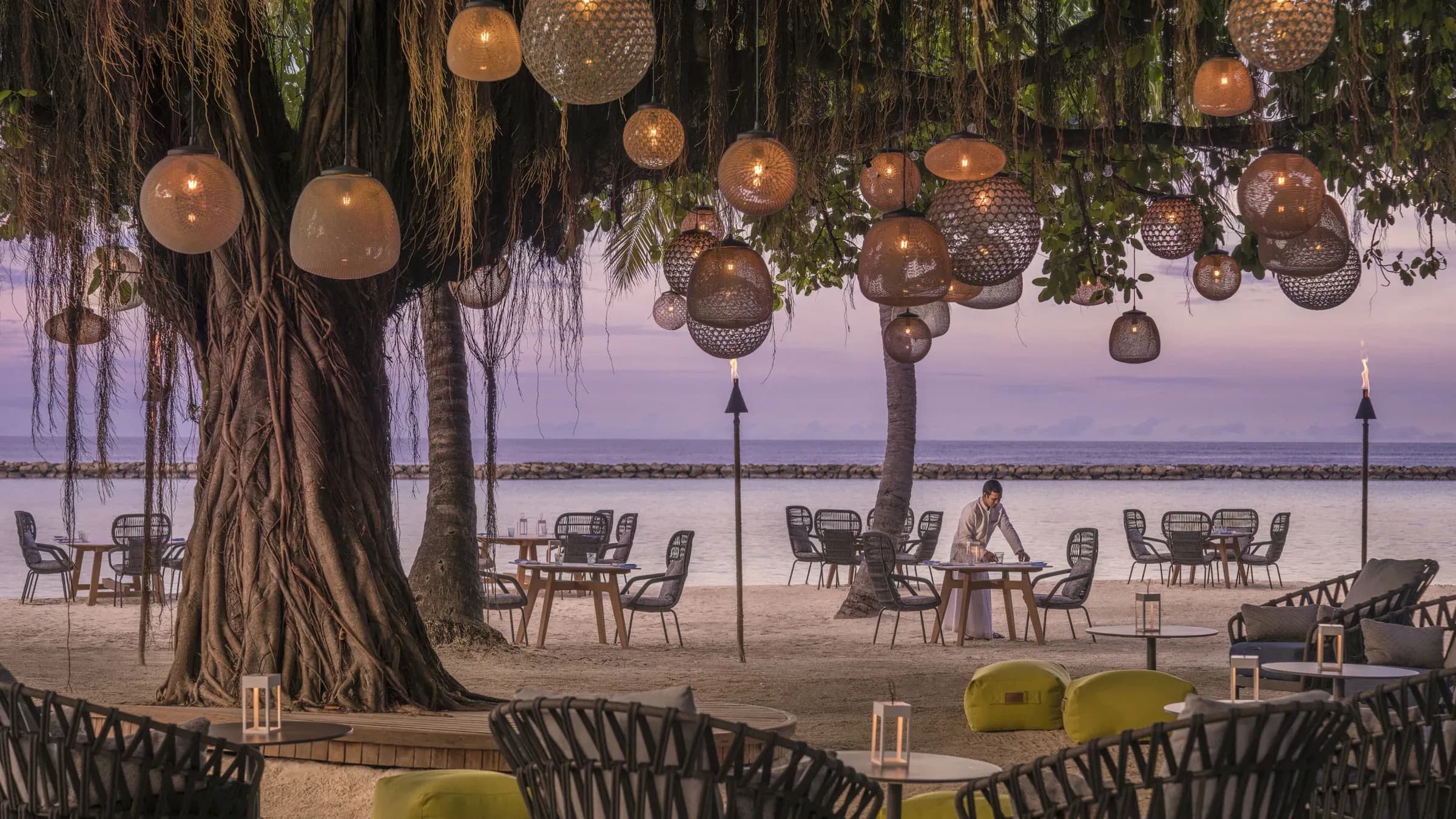 Fuego Grill beachside dining setting at Four Seasons Landaa Giraavaru