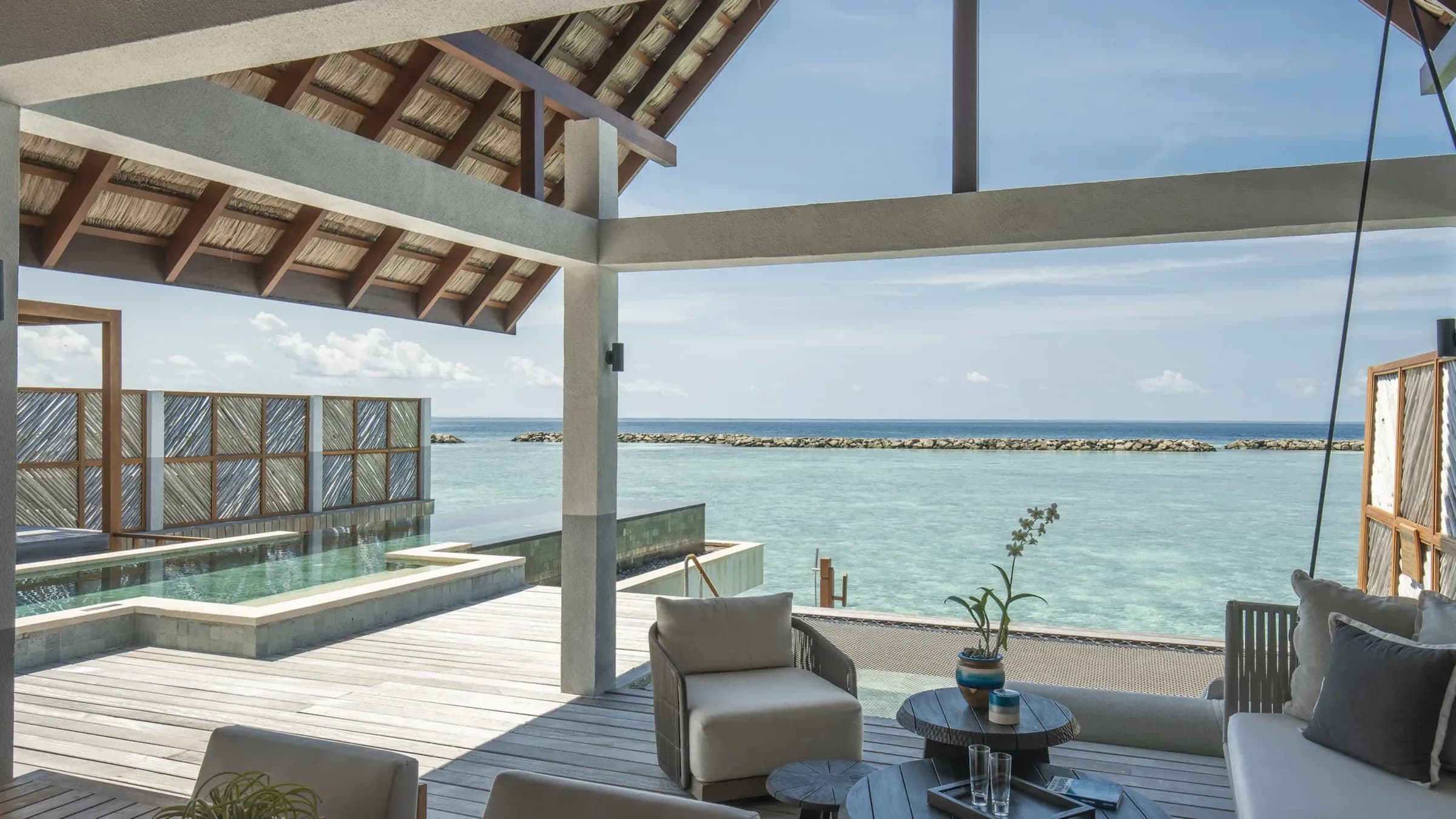 Sunrise Family Water Villa with Pool interior at Four Seasons Landaa Giraavaru