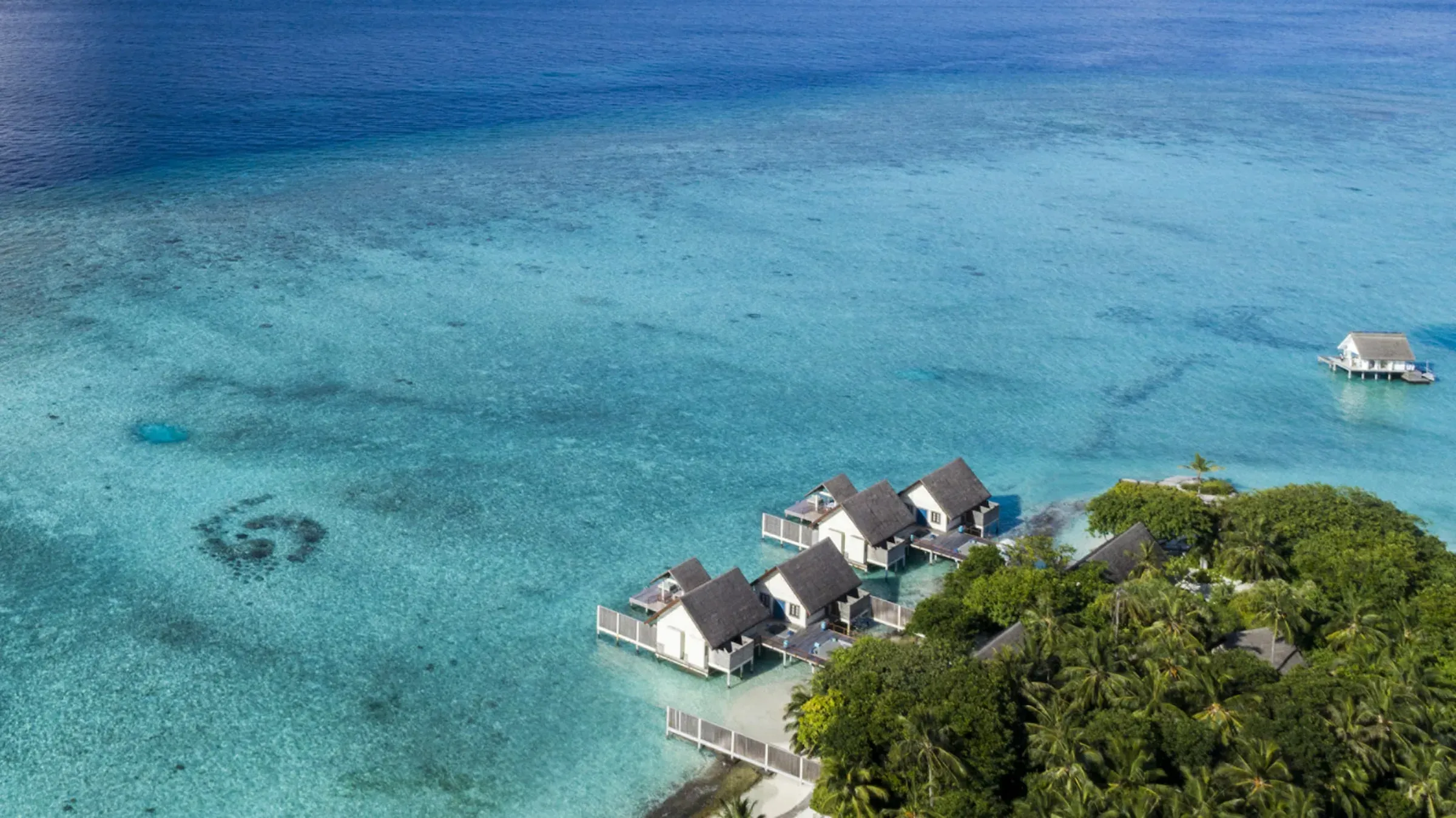 Three-Bedroom Land and Ocean Suite at Four Seasons Landaa Giraavaru
