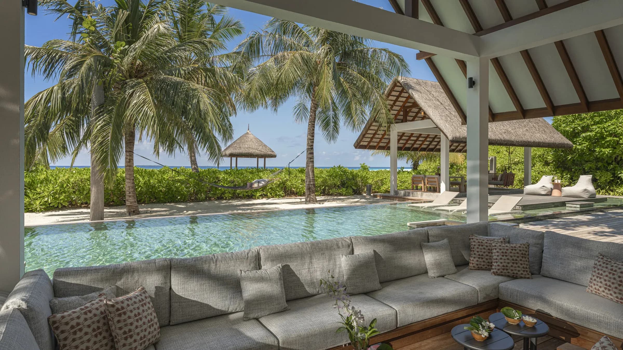 Two-Bedroom Royal Beach Villa living space at Four Seasons Landaa Giraavaru