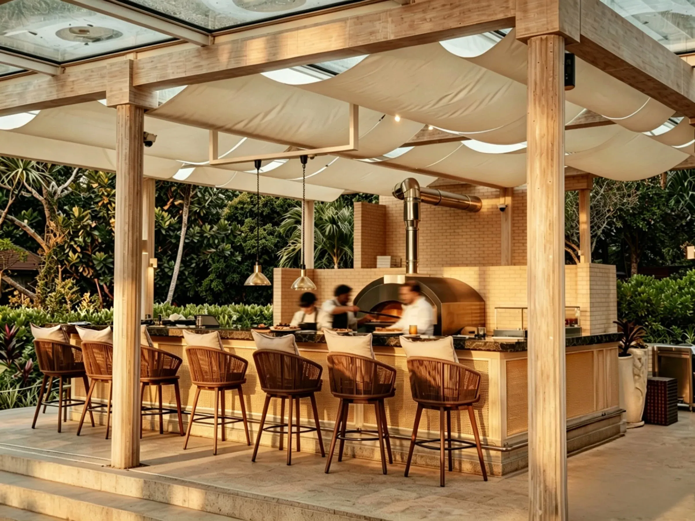 Il Forno's open-air pizza oven and dining pavilion on the beach at Four Seasons Resort Seychelles