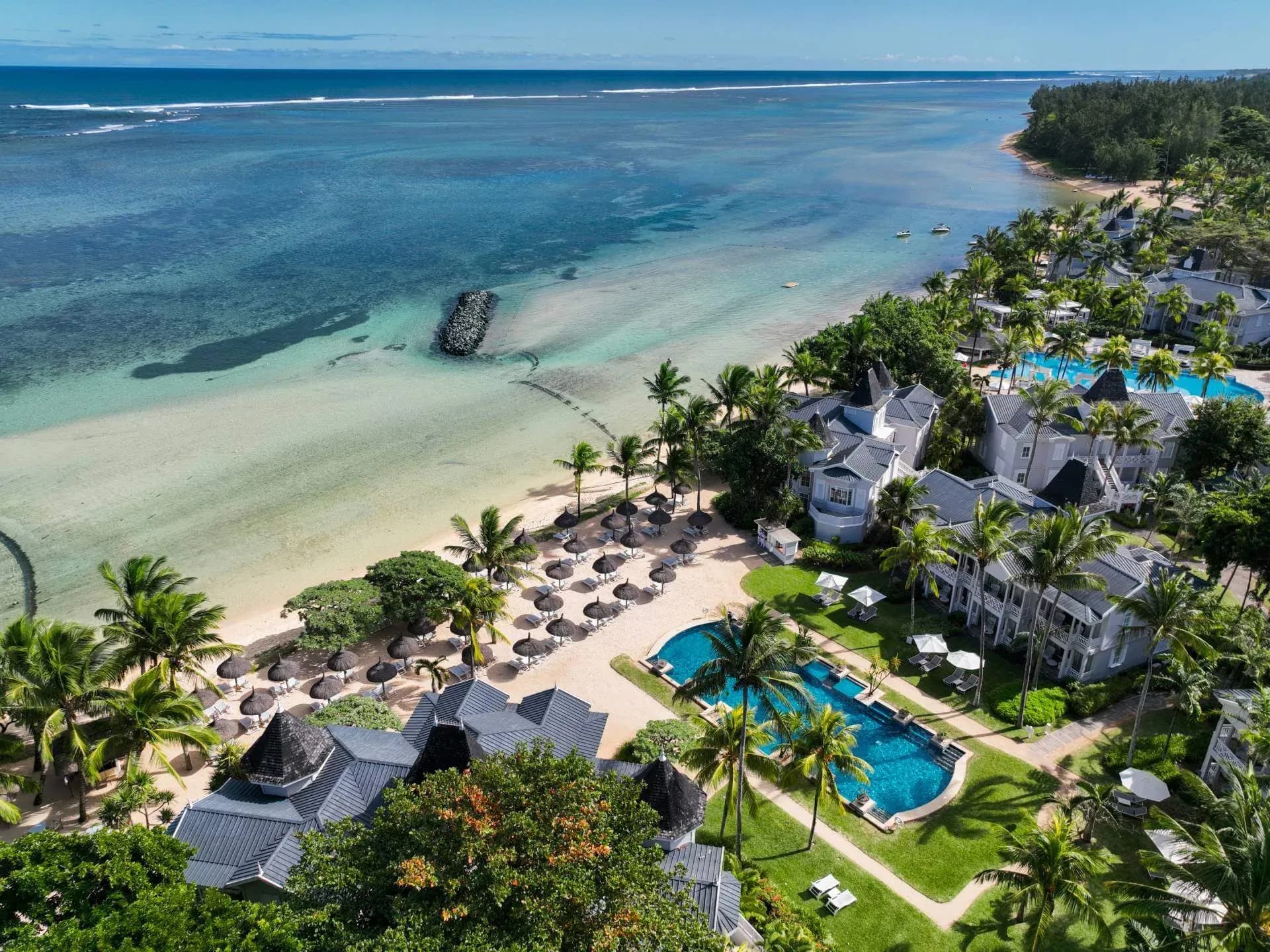 Aerial view of Heritage Le Telfair Golf & Wellness Resort's beach and lagoon, Bel Ombre, Mauritius
