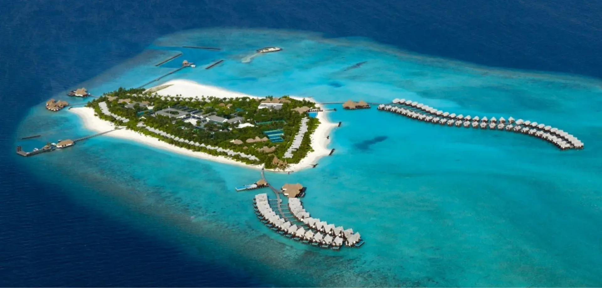 Aerial view of Heritance Aarah's overwater villas and turquoise lagoon, Raa Atoll, Maldives