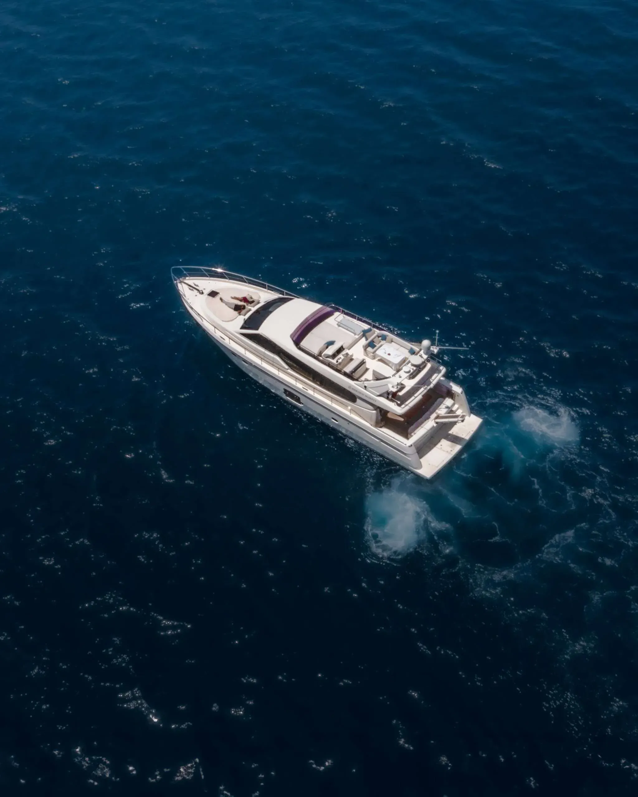 Motor yacht arriving at the Hideaway Marina, the Maldives' first yacht marina