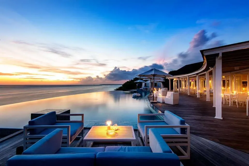 Sunset Pool Café overlooking the infinity pool at Hideaway Beach Resort & Spa