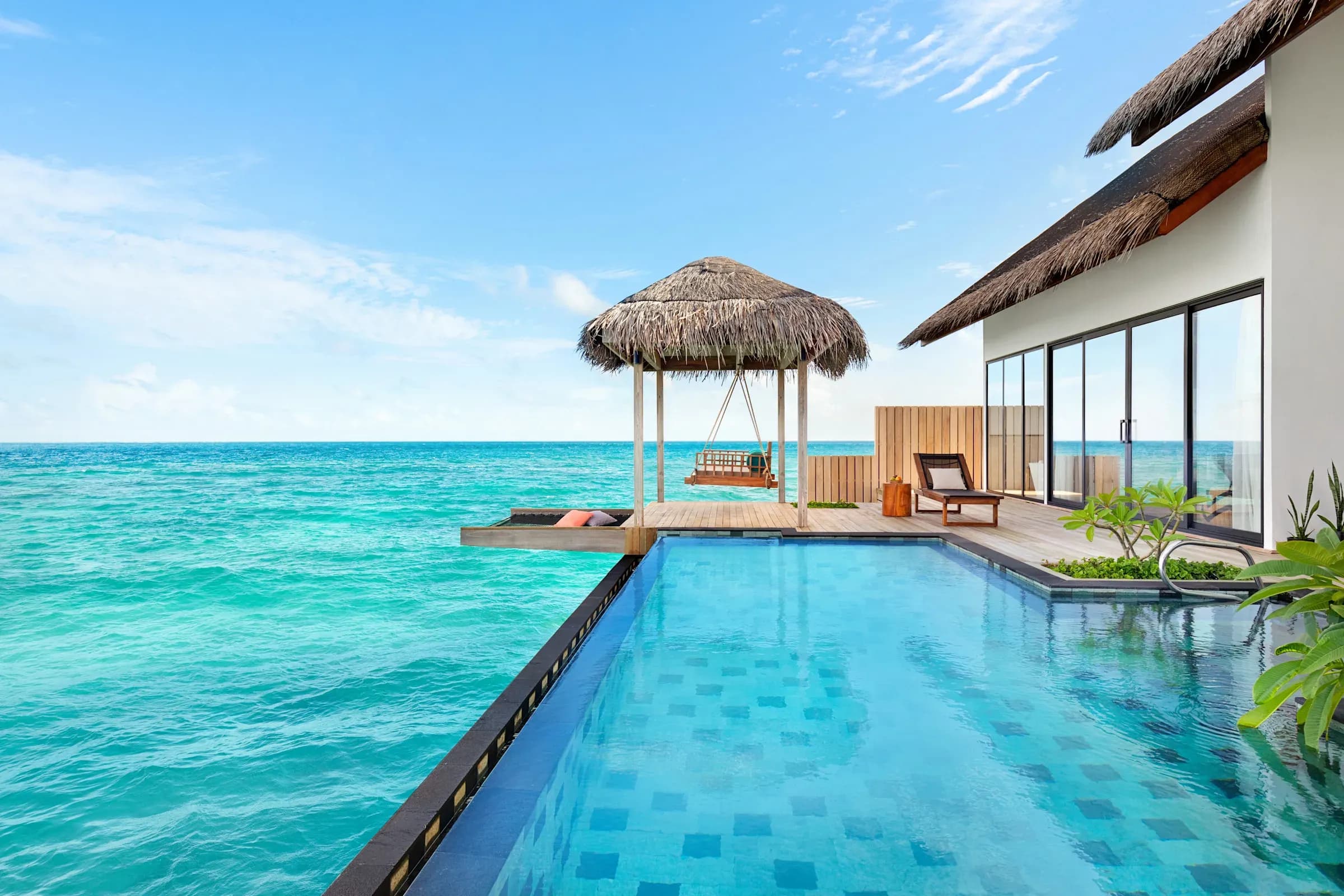 Two-Bedroom Overwater Pool Villa exterior with pool at Hilton Maldives Amingiri