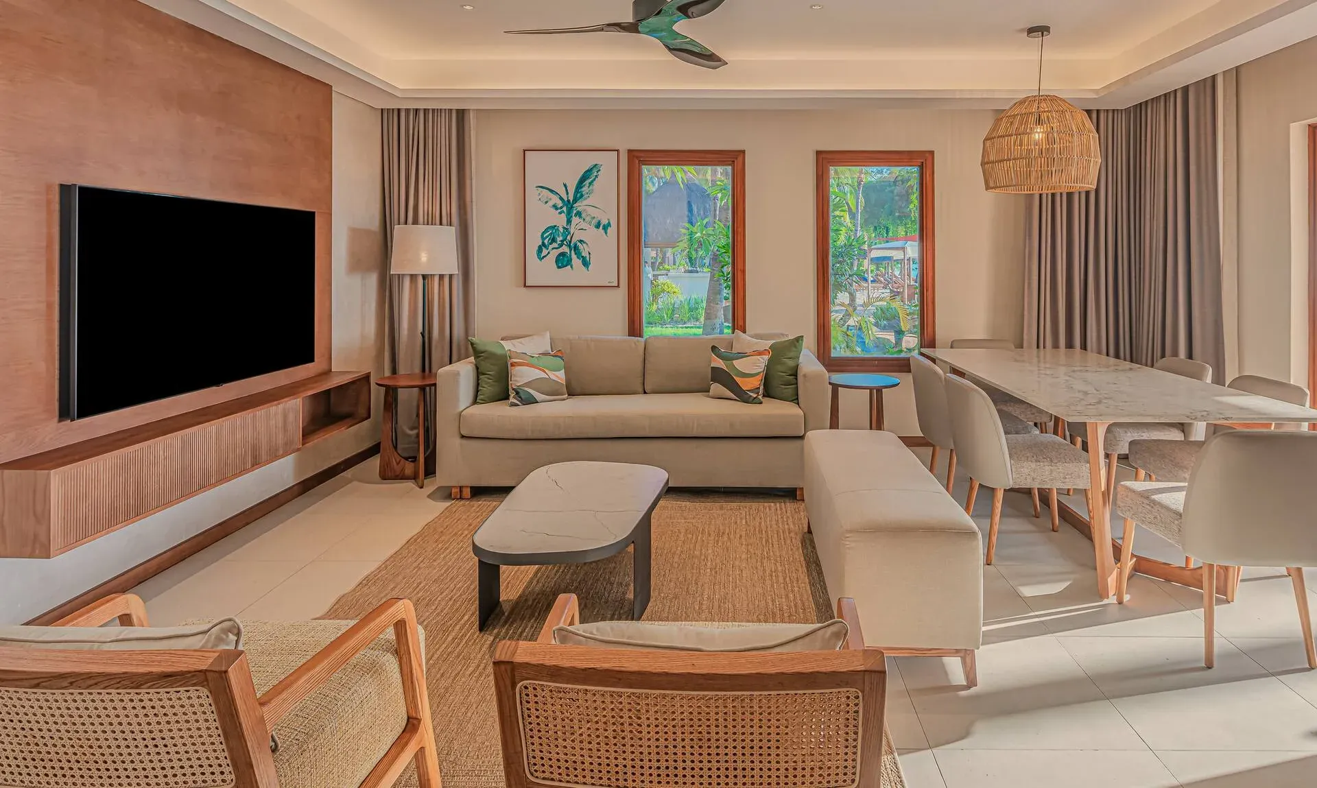 Grand Family Beachfront Suite lounge by day at Hilton Mauritius Resort & Spa