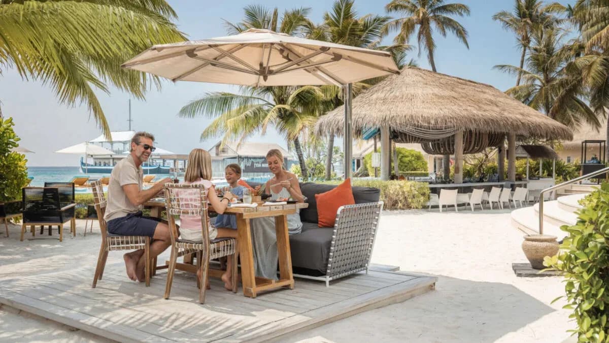 Cafe Umi beachfront breakfast setting at InterContinental Maldives Maamunagau Resort