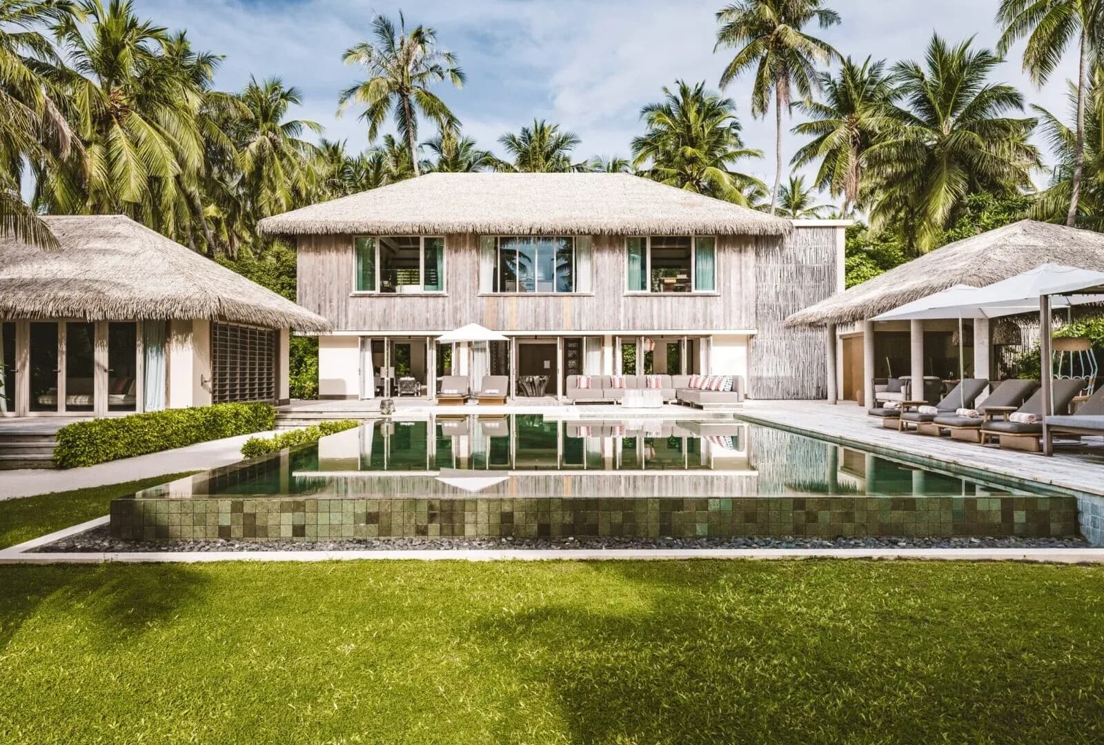 Three Bedroom Royal Beachfront Pool Residence garden and swimming pool