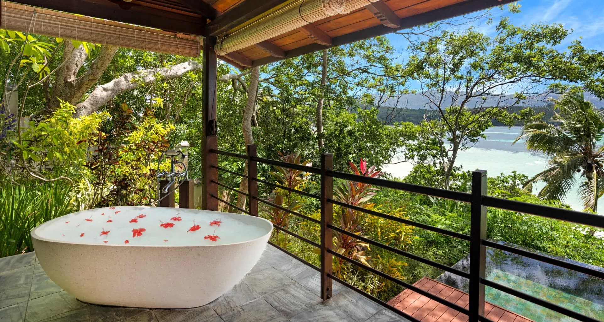 Private Pool Villa bedroom with ocean view at JA Enchanted Island Resort