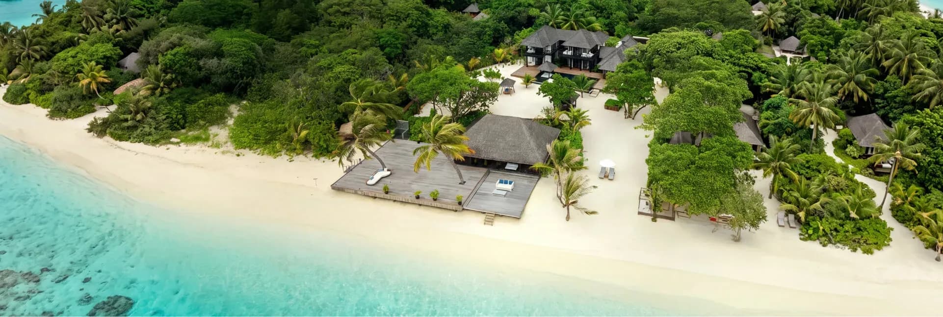3 Bedroom Royal Beach Residence dining and wine cellar detail at JA Manafaru