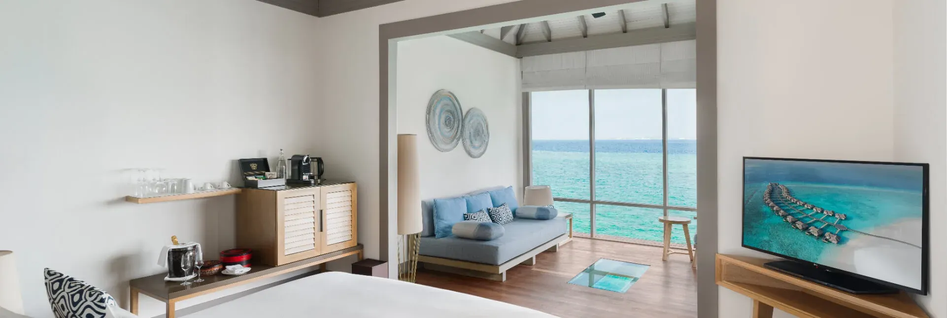 Sunrise Water Villa with Infinity Pool bedroom interior at JA Manafaru