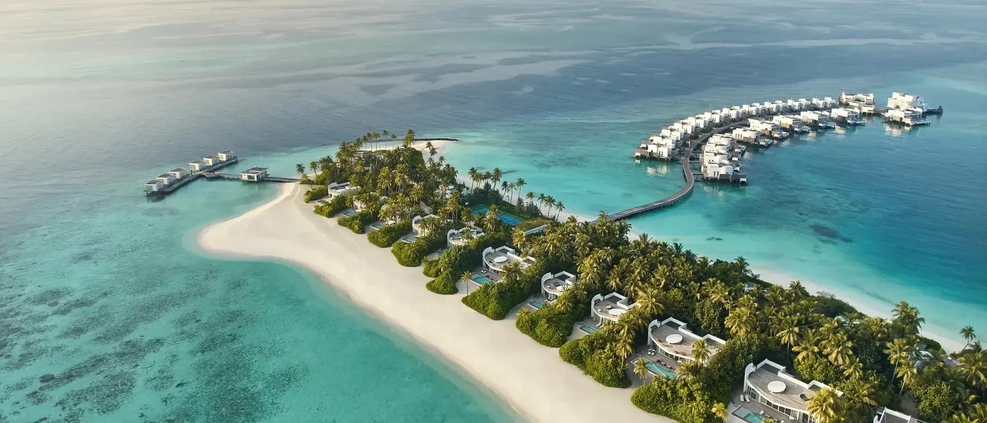 Aerial view of Jumeirah Olhahali Island at sunset, North Malé Atoll, Maldives
