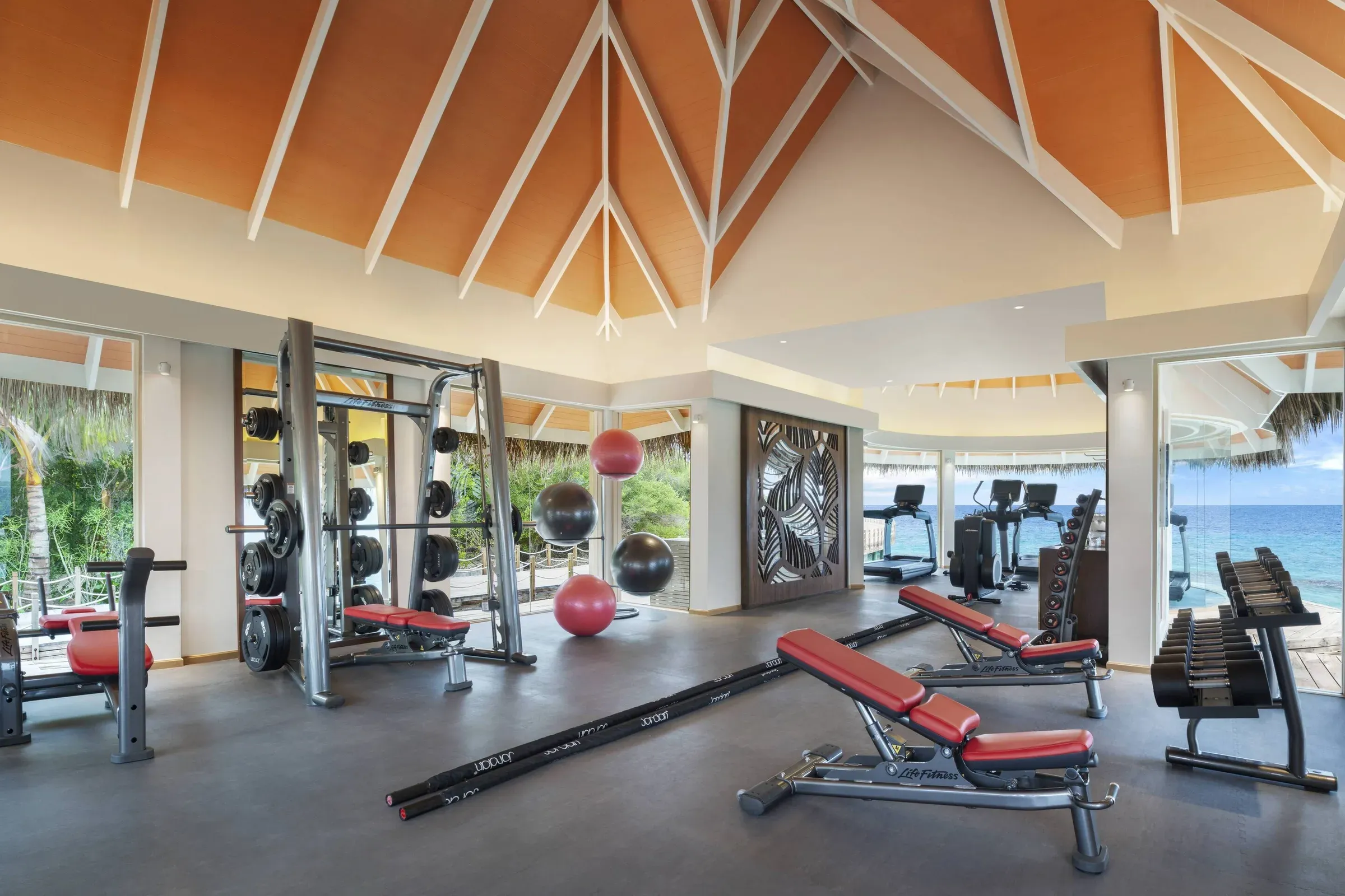 Ocean-view fitness centre at JW Marriott Maldives Resort & Spa