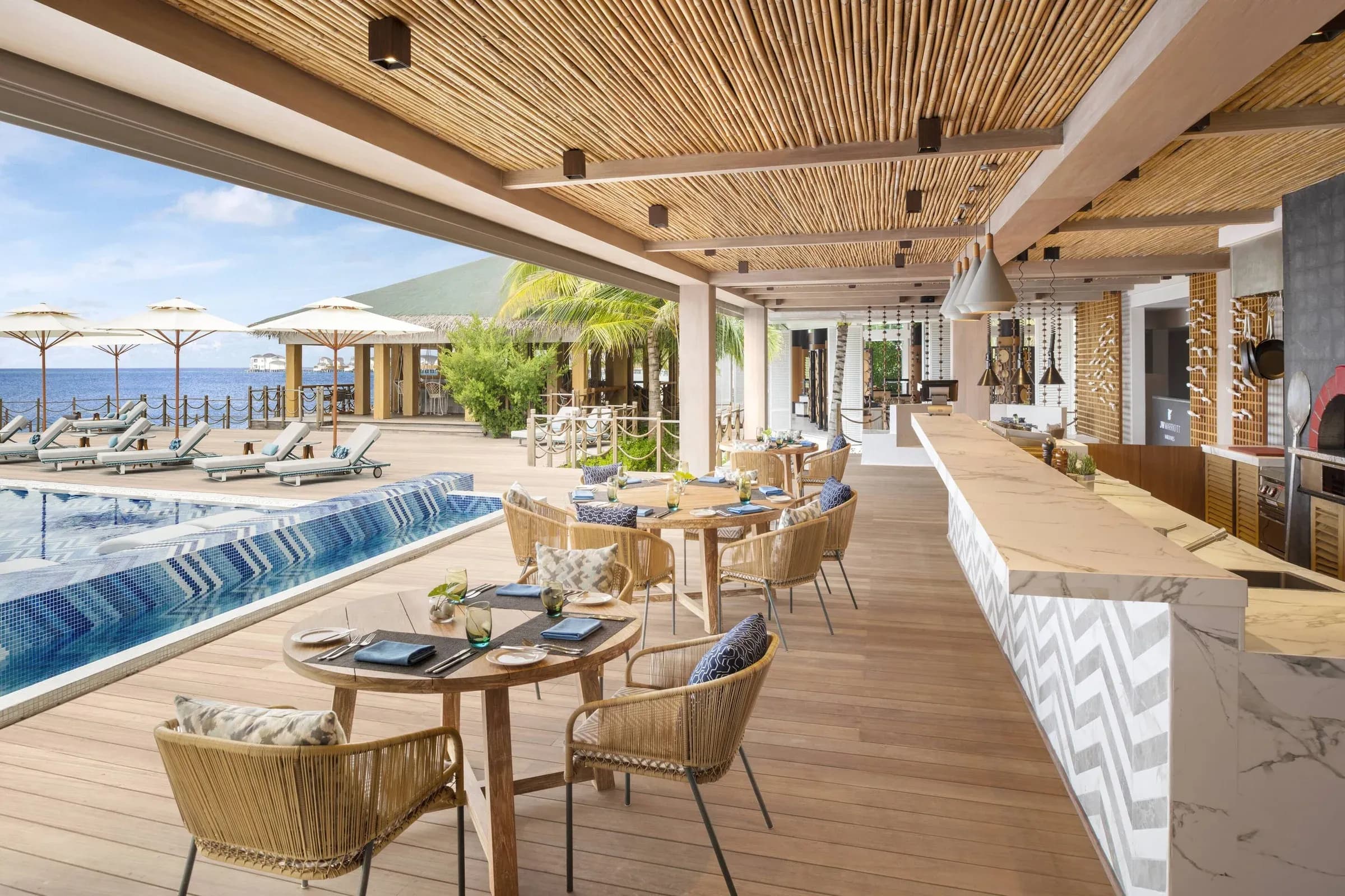 Fiamma Italian restaurant terrace beside the pool at JW Marriott Maldives Resort & Spa