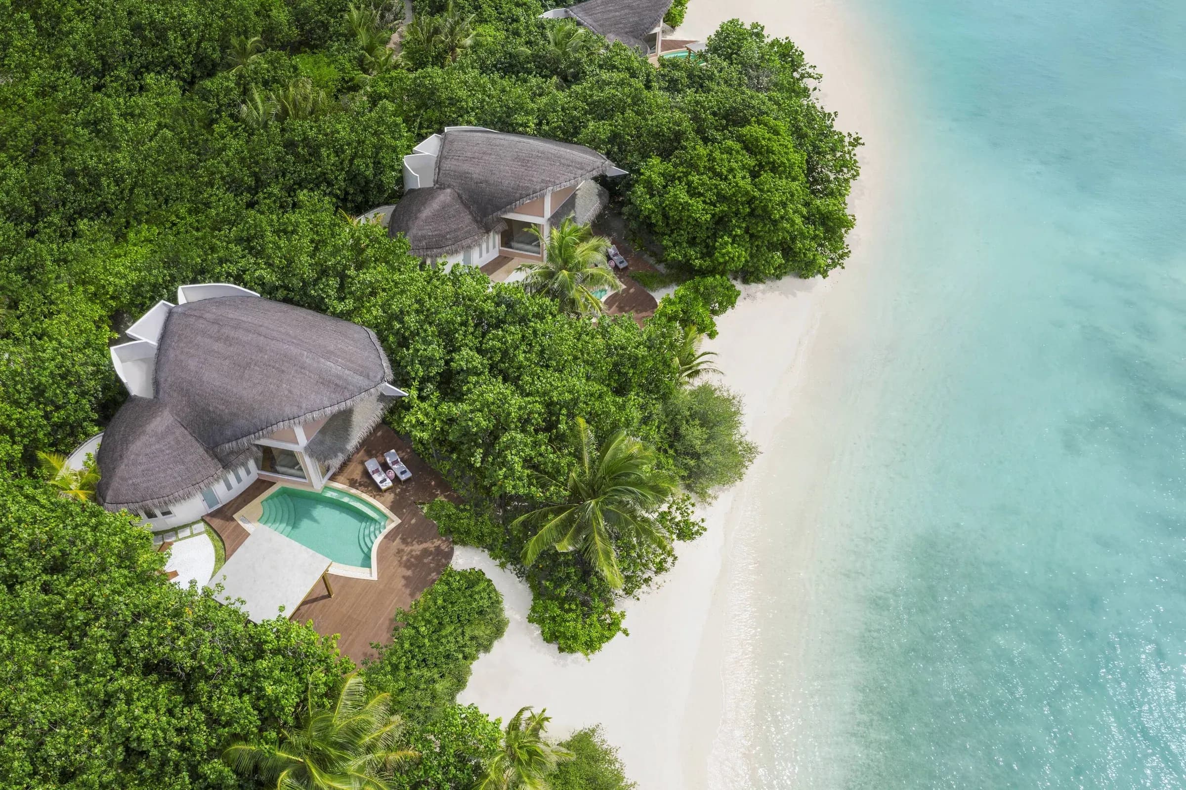 Beach Pool Villa exterior with private pool and tropical garden at JW Marriott Maldives Resort & Spa