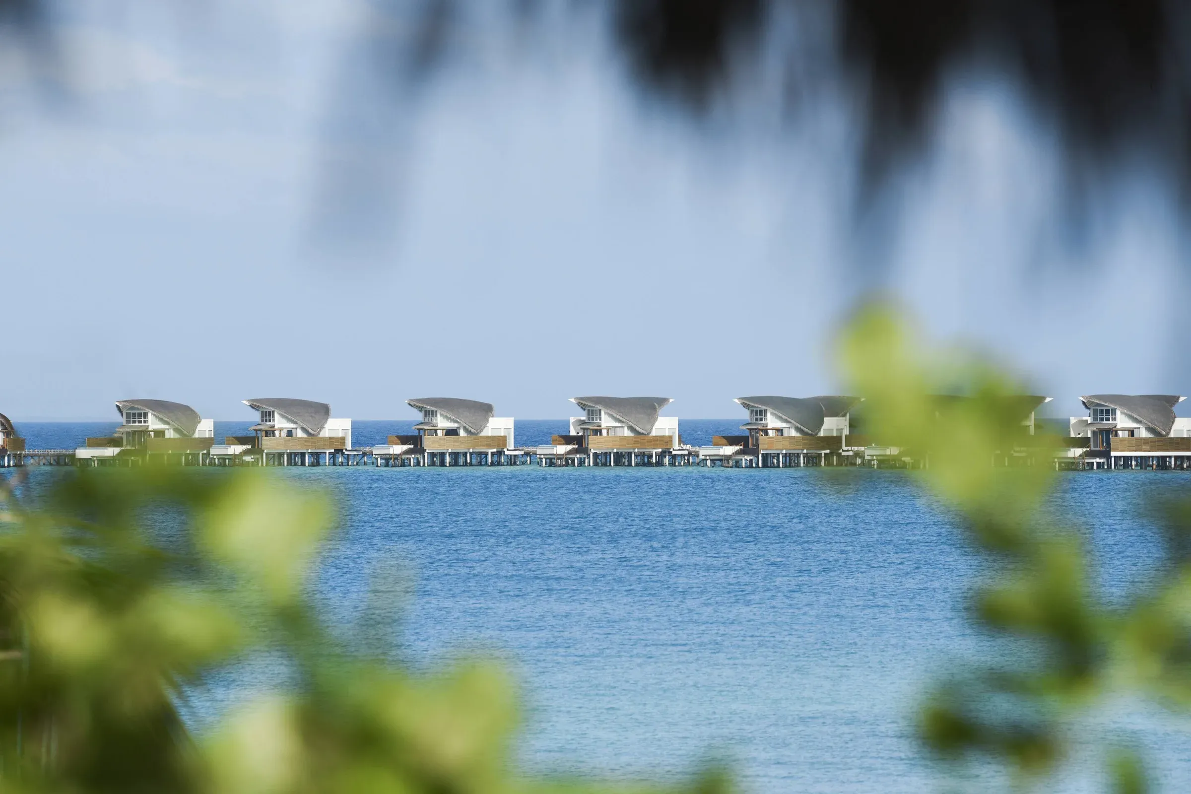 Overwater Pool Villa deck and private plunge pool at JW Marriott Maldives Resort & Spa