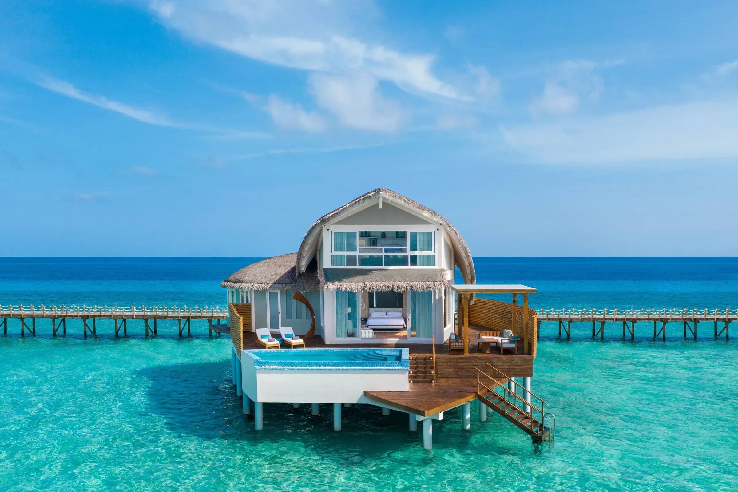Two-Bedroom Duplex Beach Pool Villa exterior on the beachfront at JW Marriott Maldives Resort & Spa