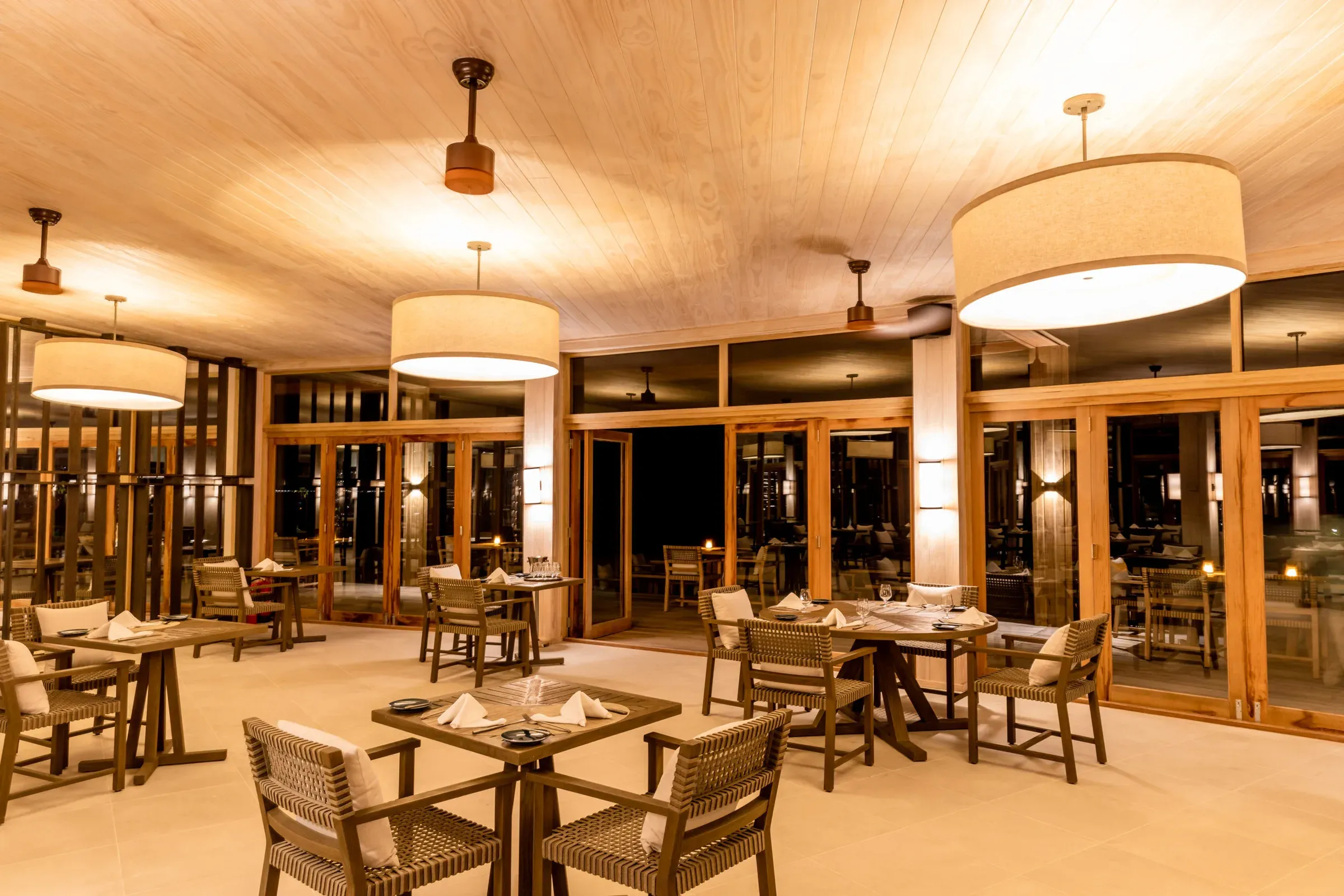 Evening dining room at Noo Faru restaurant, Kagi Maldives Resort & Spa