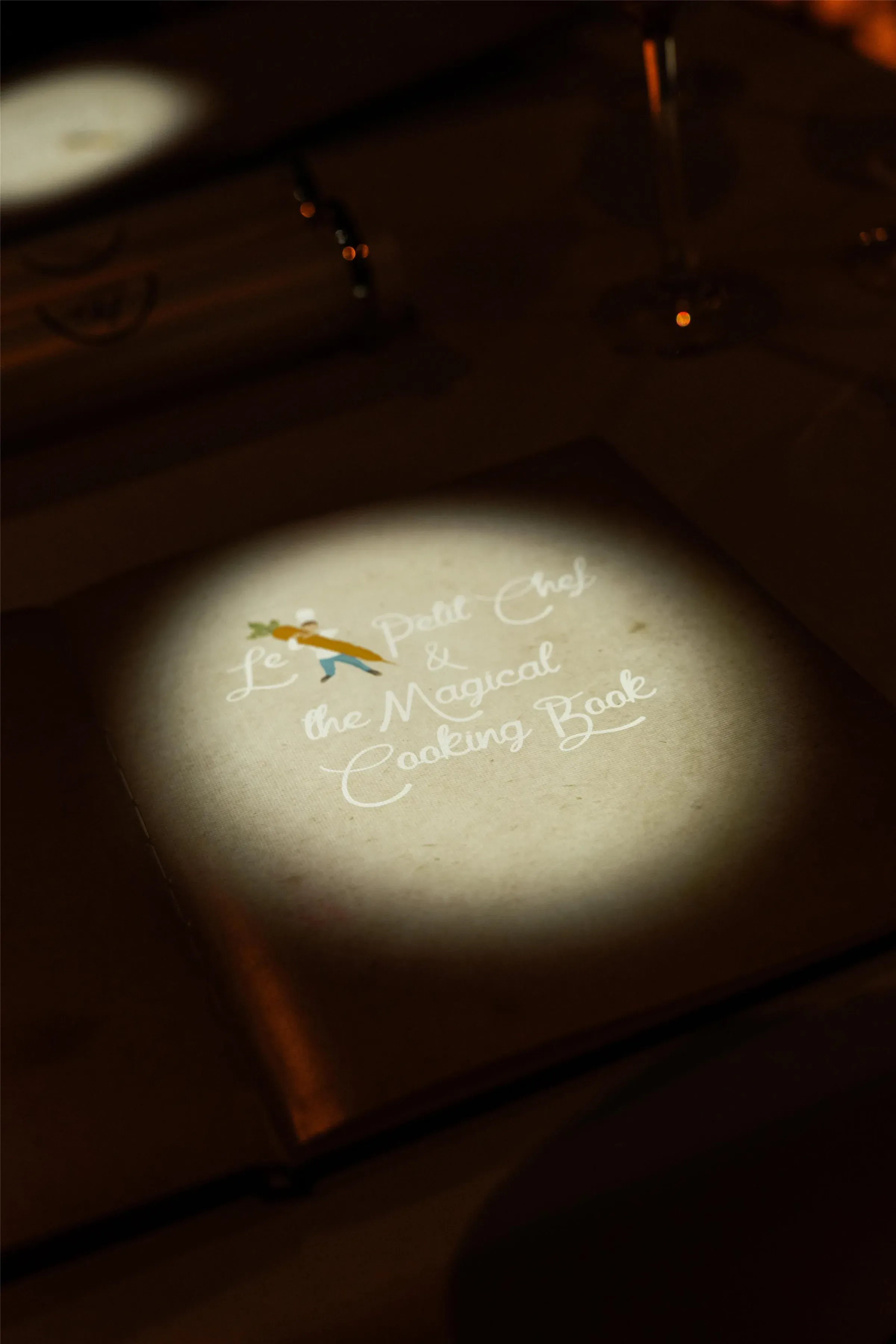 Le Petit Chef immersive dining table setting at Kempinski Seychelles Resort