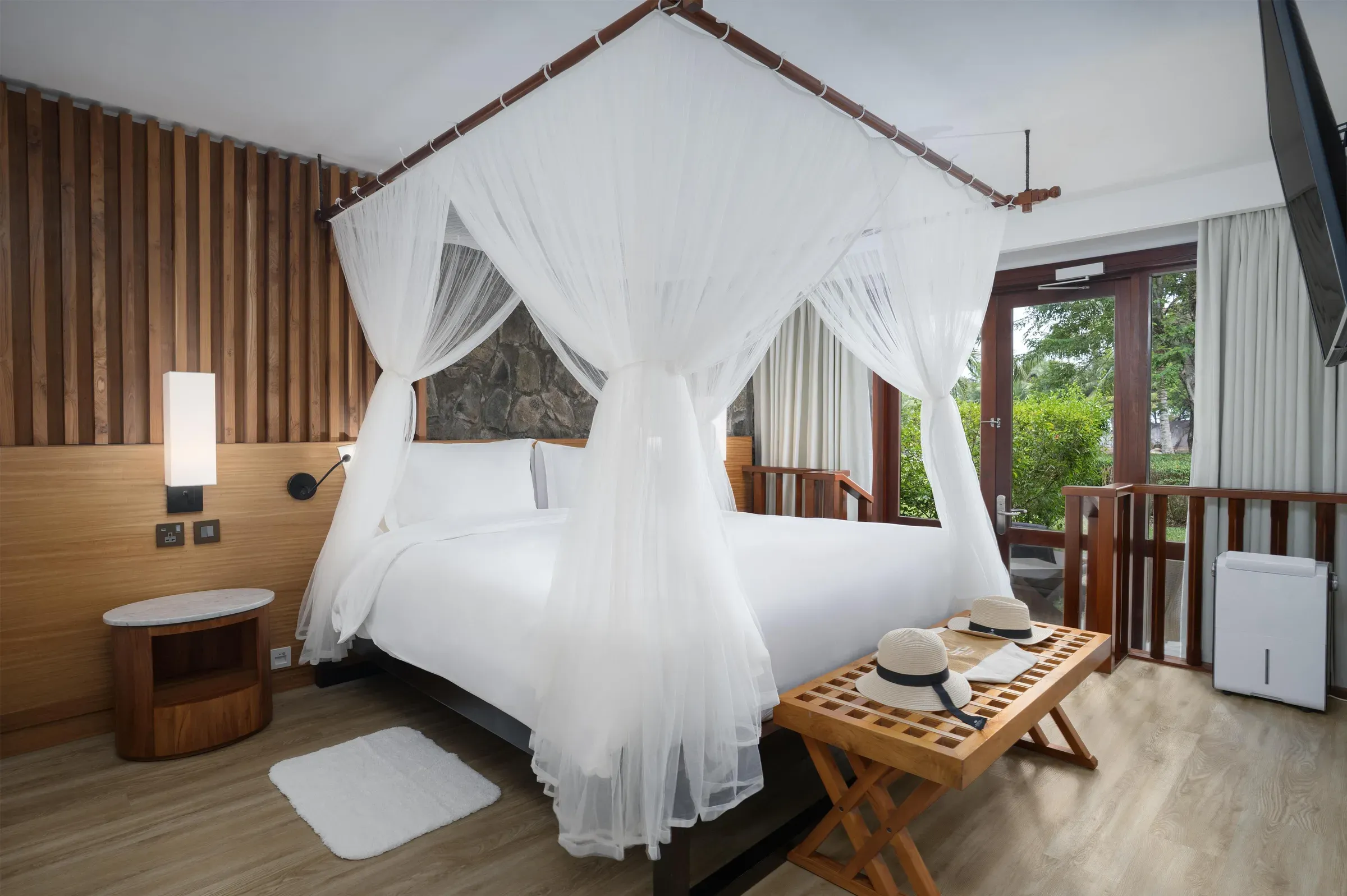 Deluxe Lagoon View Suite interior at Kempinski Seychelles Resort