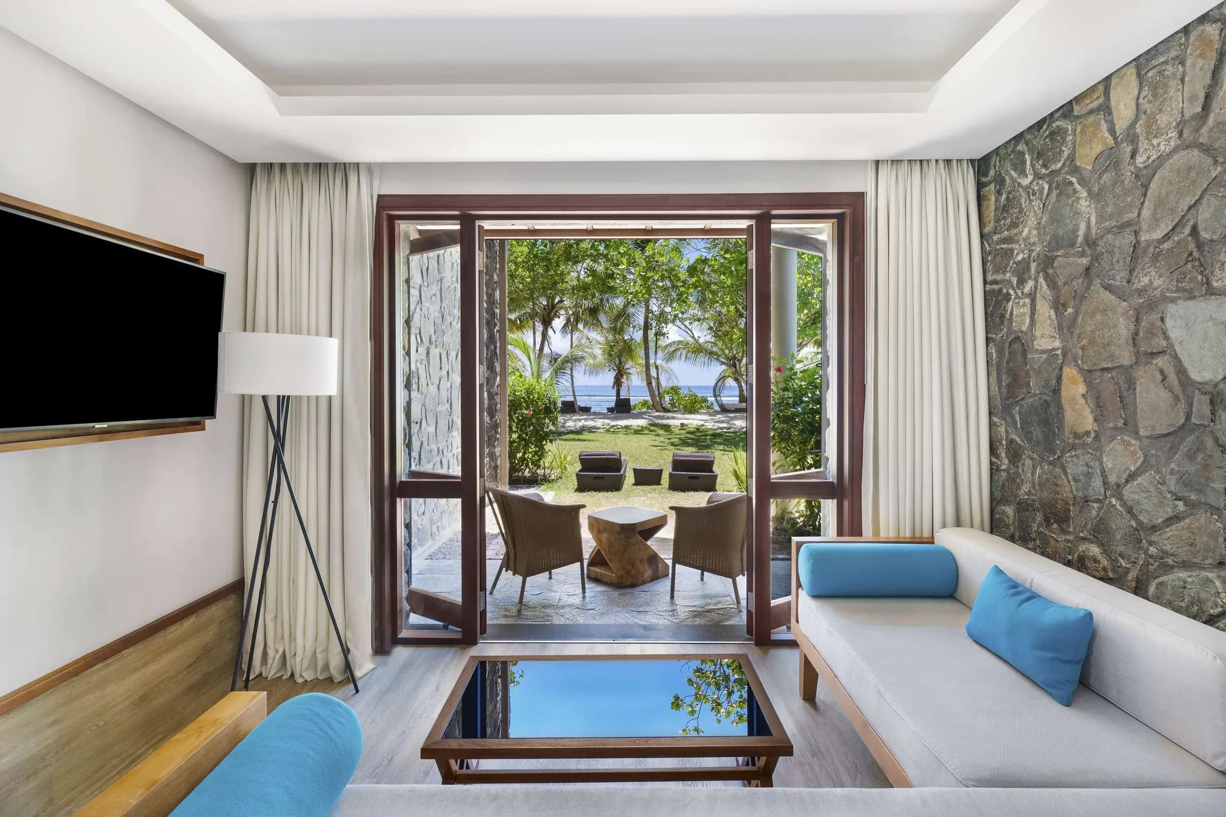 Deluxe Ocean View Garden Room interior at Kempinski Seychelles Resort