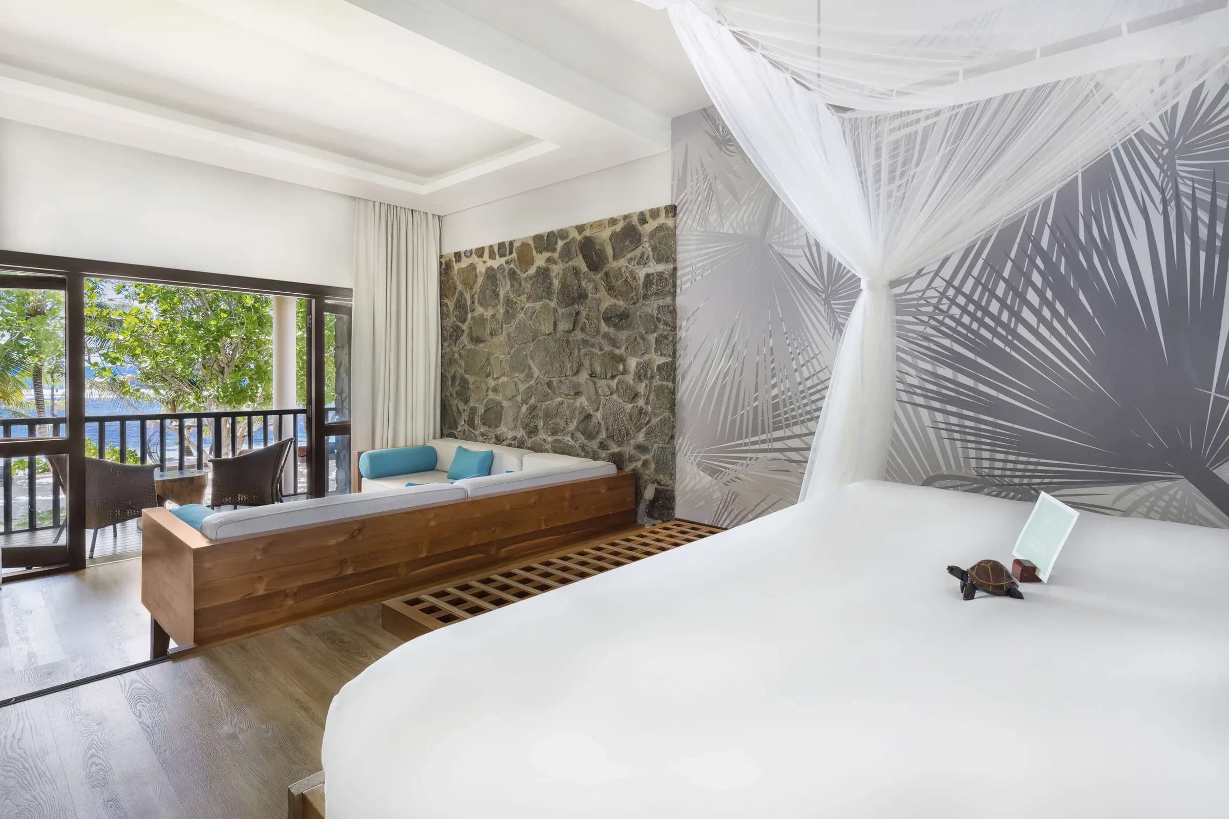 Deluxe Ocean View Room interior at Kempinski Seychelles Resort