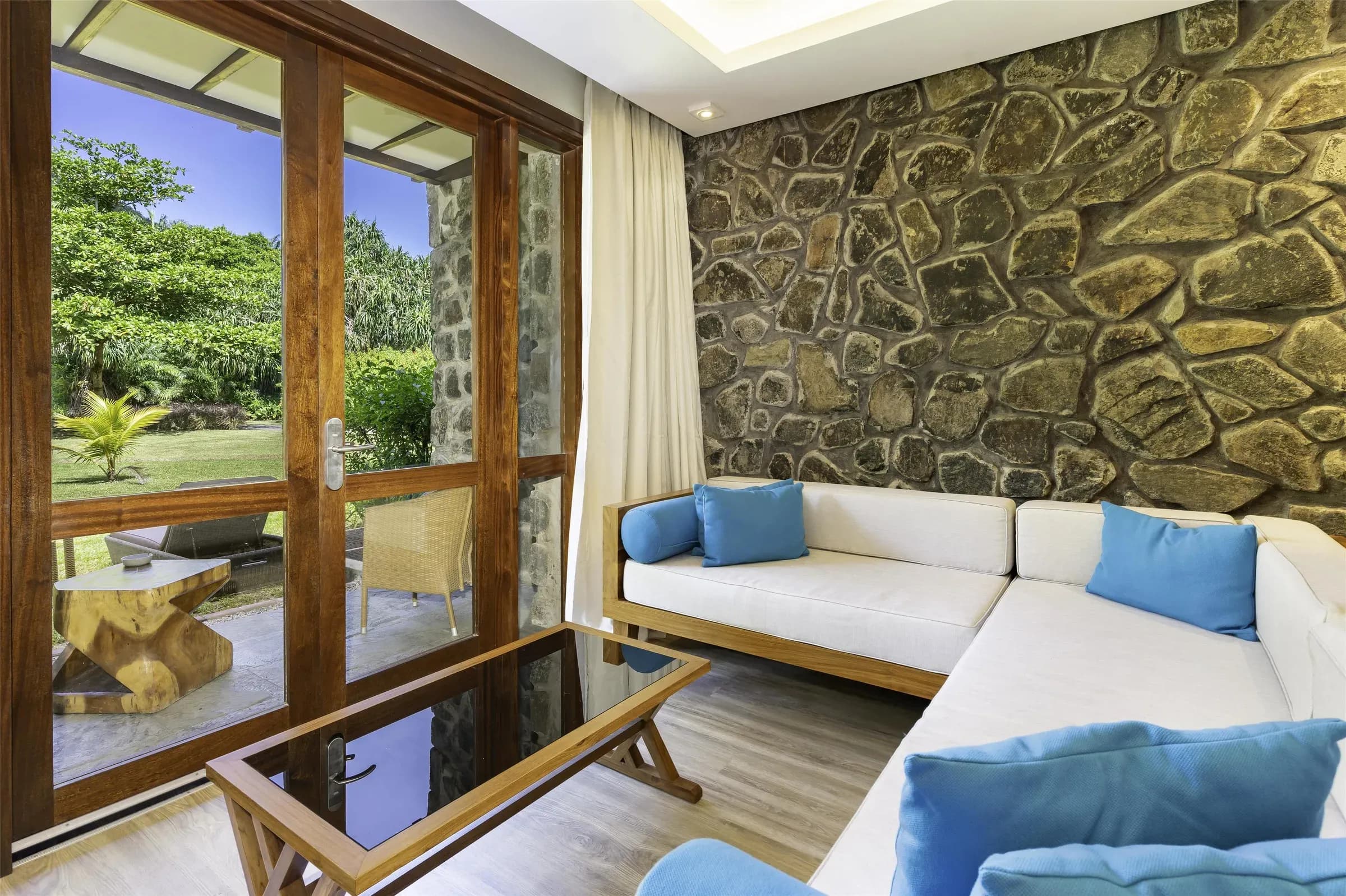 Superior Hill View Room interior at Kempinski Seychelles Resort