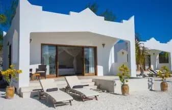 Exterior terrace of a Beach Pavilion with loungers at Konokono Beach Resort