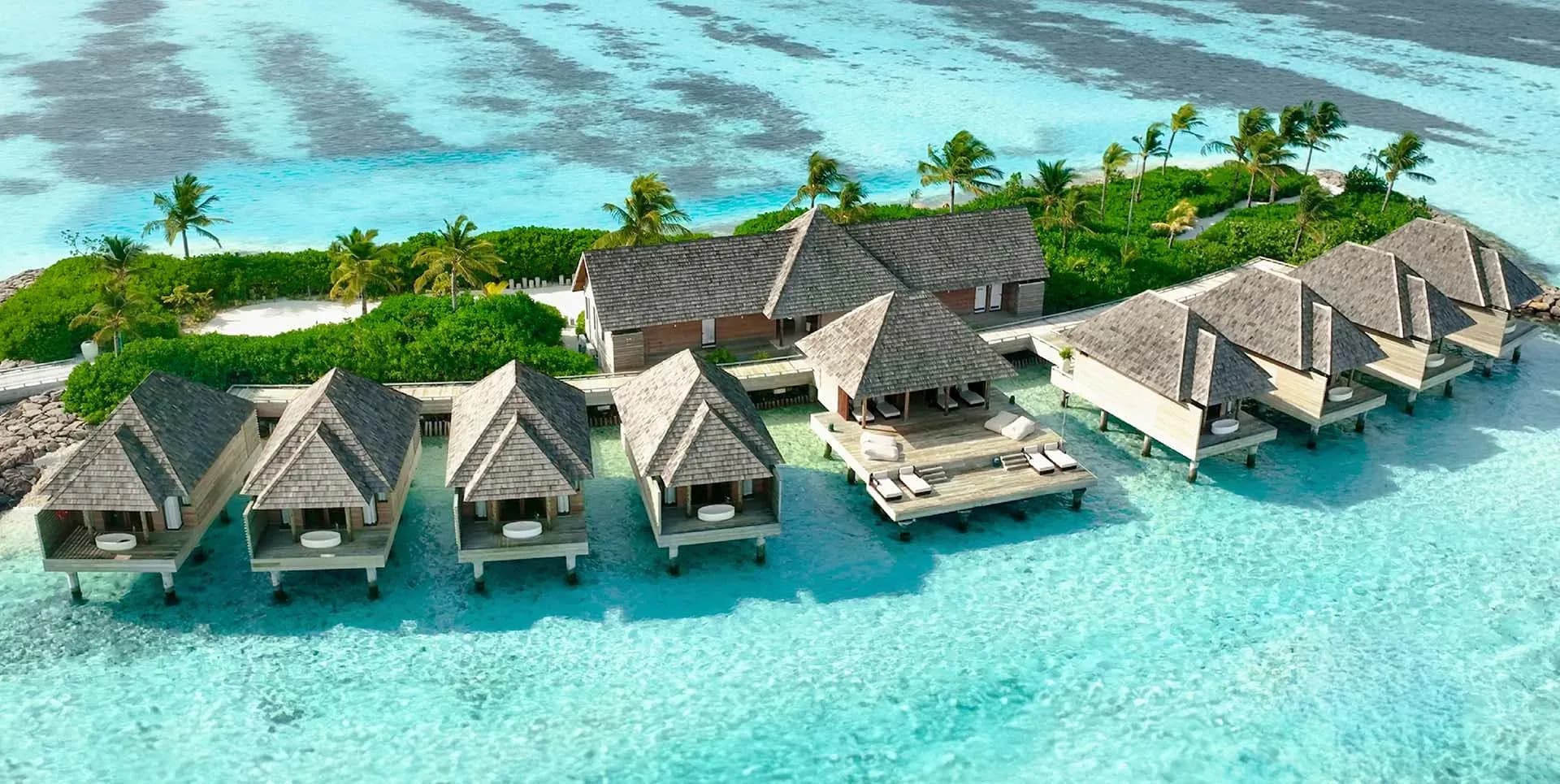 Aerial view of the overwater treatment villas at The Spa, Kuda Villingili Resort Maldives