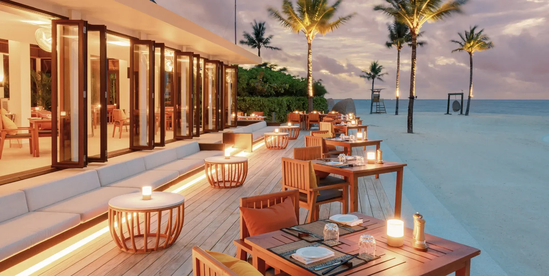 Beachfront terrace dining at Mar-Umi, the Japanese-Peruvian restaurant at Kuda Villingili Resort Maldives