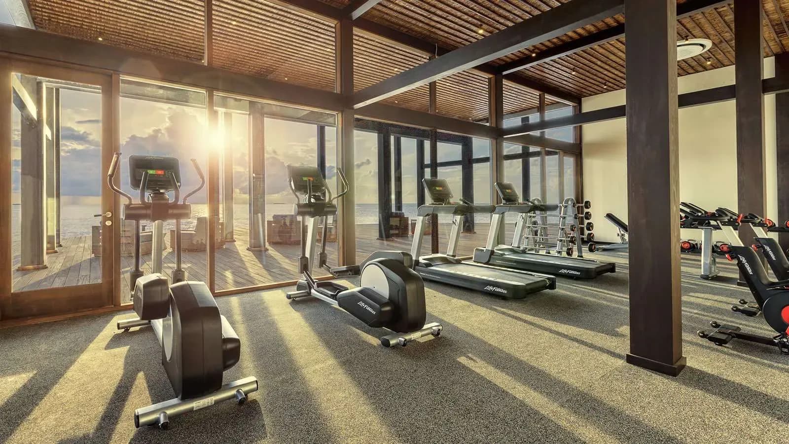 Overwater fitness centre with ocean views at Kudadoo Maldives Private Island