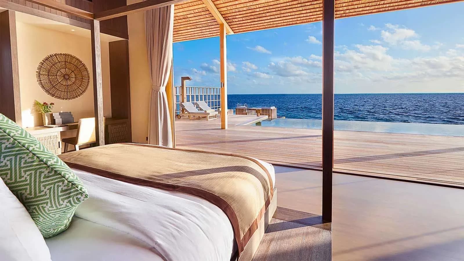 One-Bedroom Residence interior with private infinity pool deck and ocean view at Kudadoo Maldives Private Island