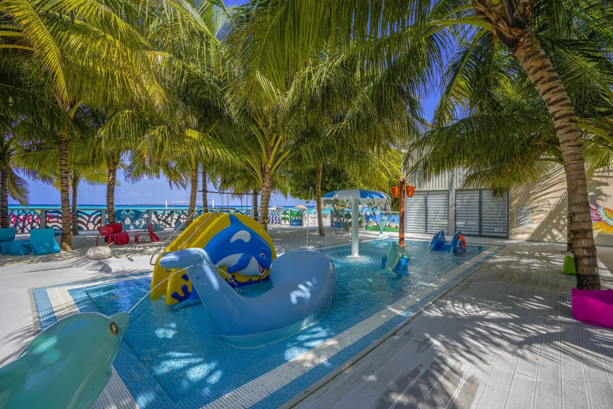 Outdoor playground and pool at the Kids Club, Kuredhivaru Resort and Spa