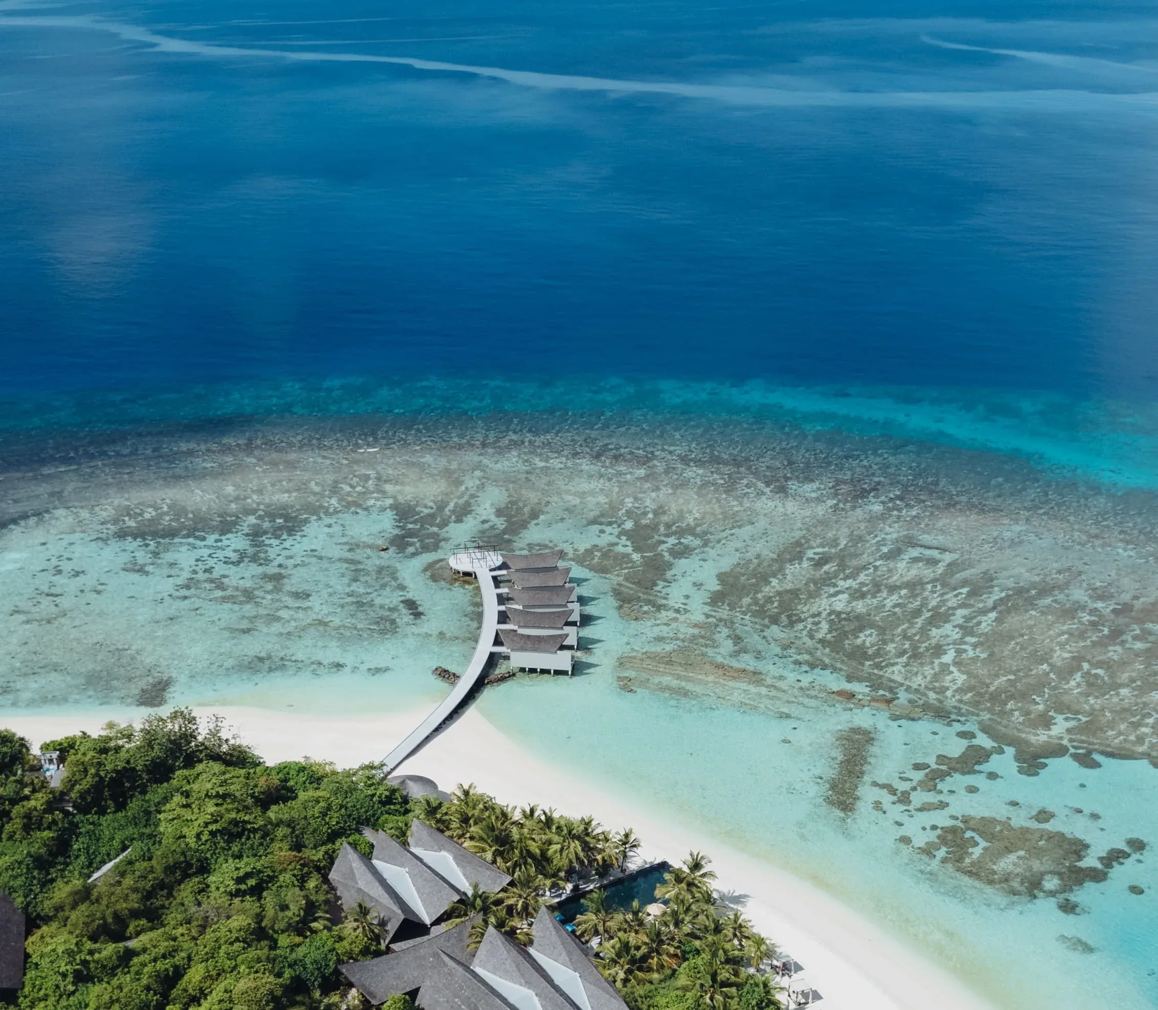 Overwater treatment pavilions of Sun Spa by Healing Earth at Kuredhivaru Resort and Spa