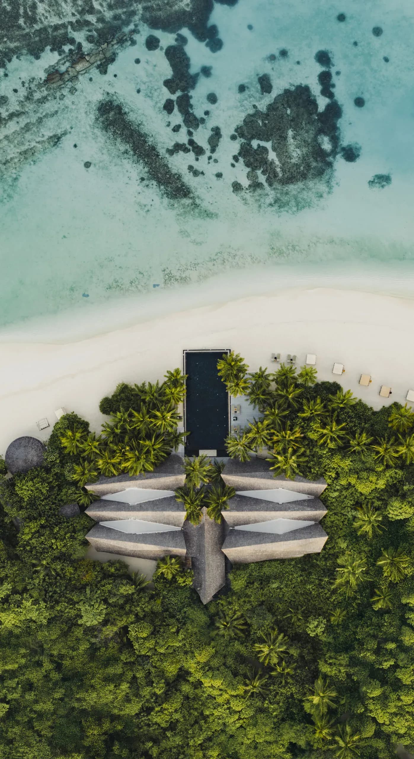 Aerial view of the pool deck at Latitude 5.5, the poolside restaurant at Kuredhivaru Resort and Spa