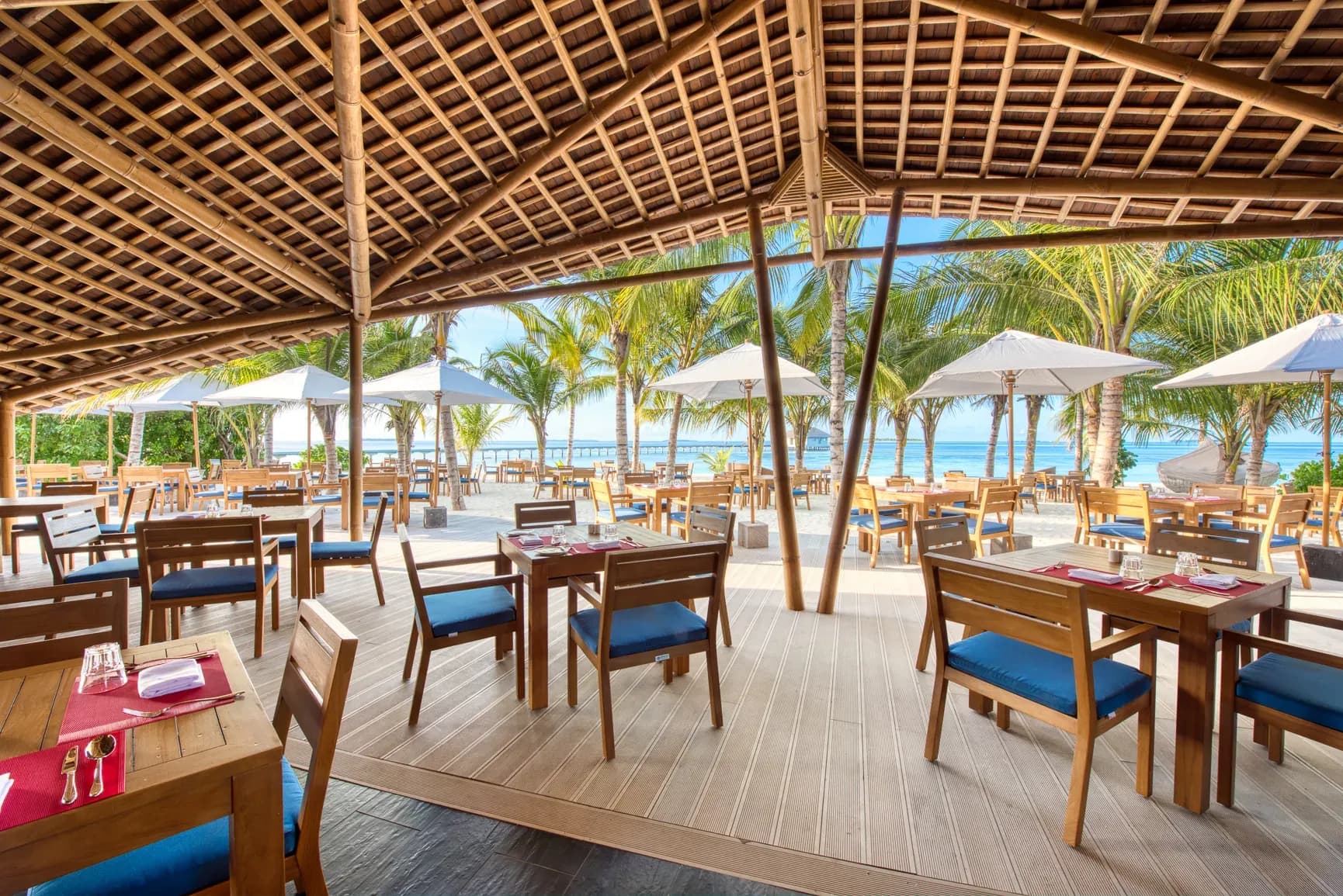 Bamboo-roofed dining pavilion at Onu Marche, the market-style restaurant at Kuredhivaru Resort and Spa