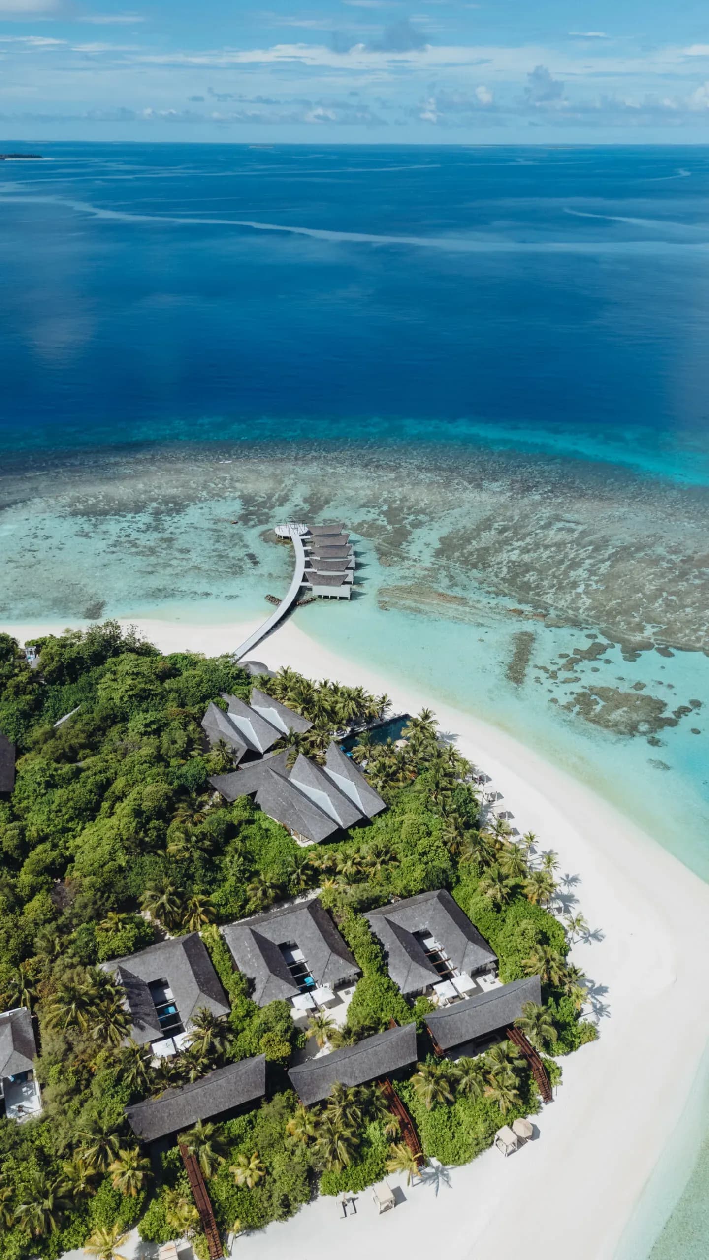 Aerial view of the Three-Bedroom Beach Pool Residence pool and gardens at Kuredhivaru Resort and Spa