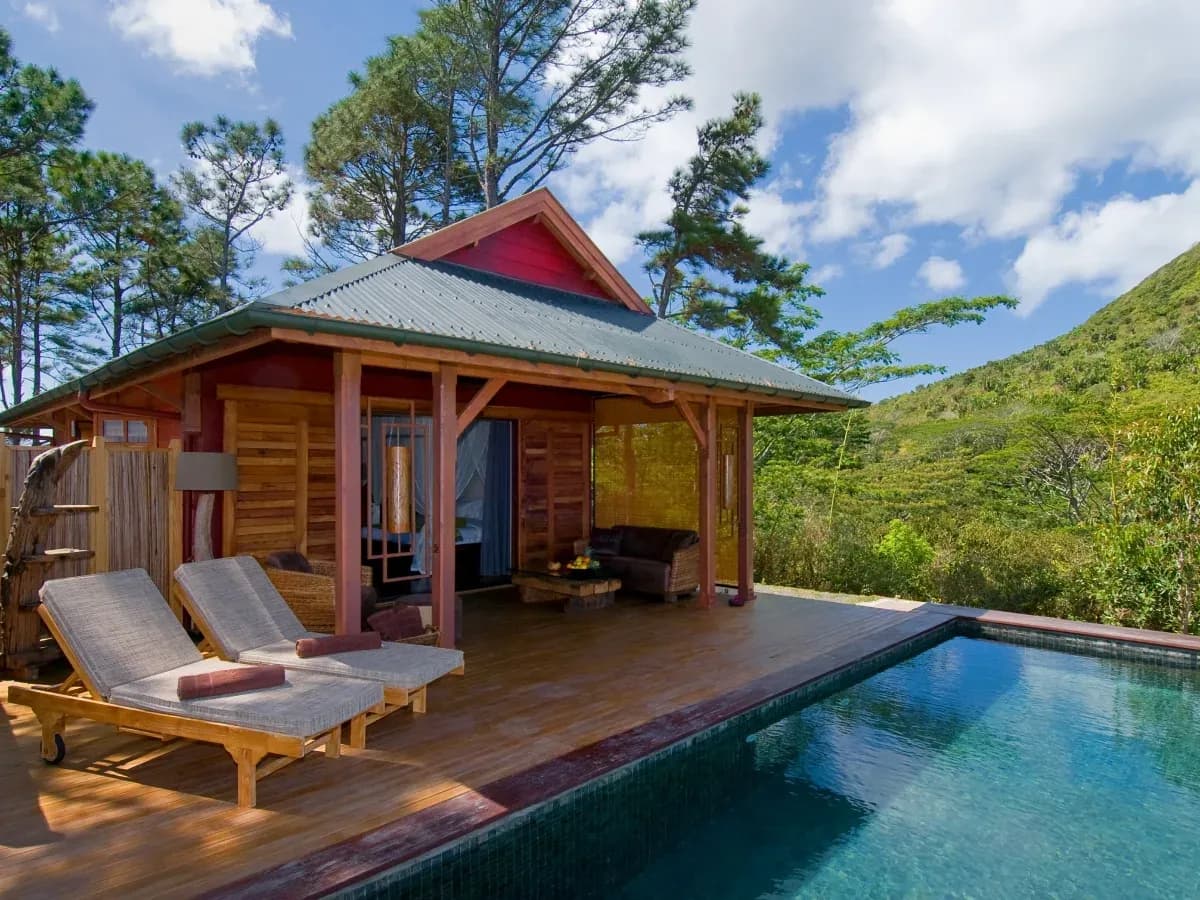 Private pool of the Exclusive Suite Piton Canot with panoramic mountain and coastal views