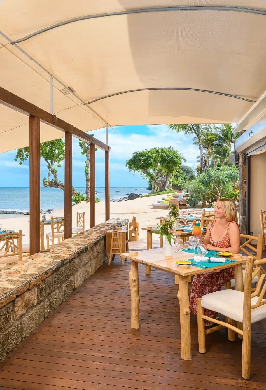 Cruso on the Beach seafood restaurant set on the sand at Le Jadis