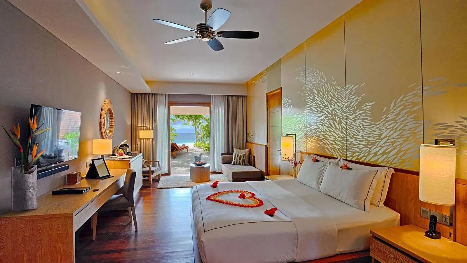 Beach Suite bedroom at Lily Beach Resort & Spa