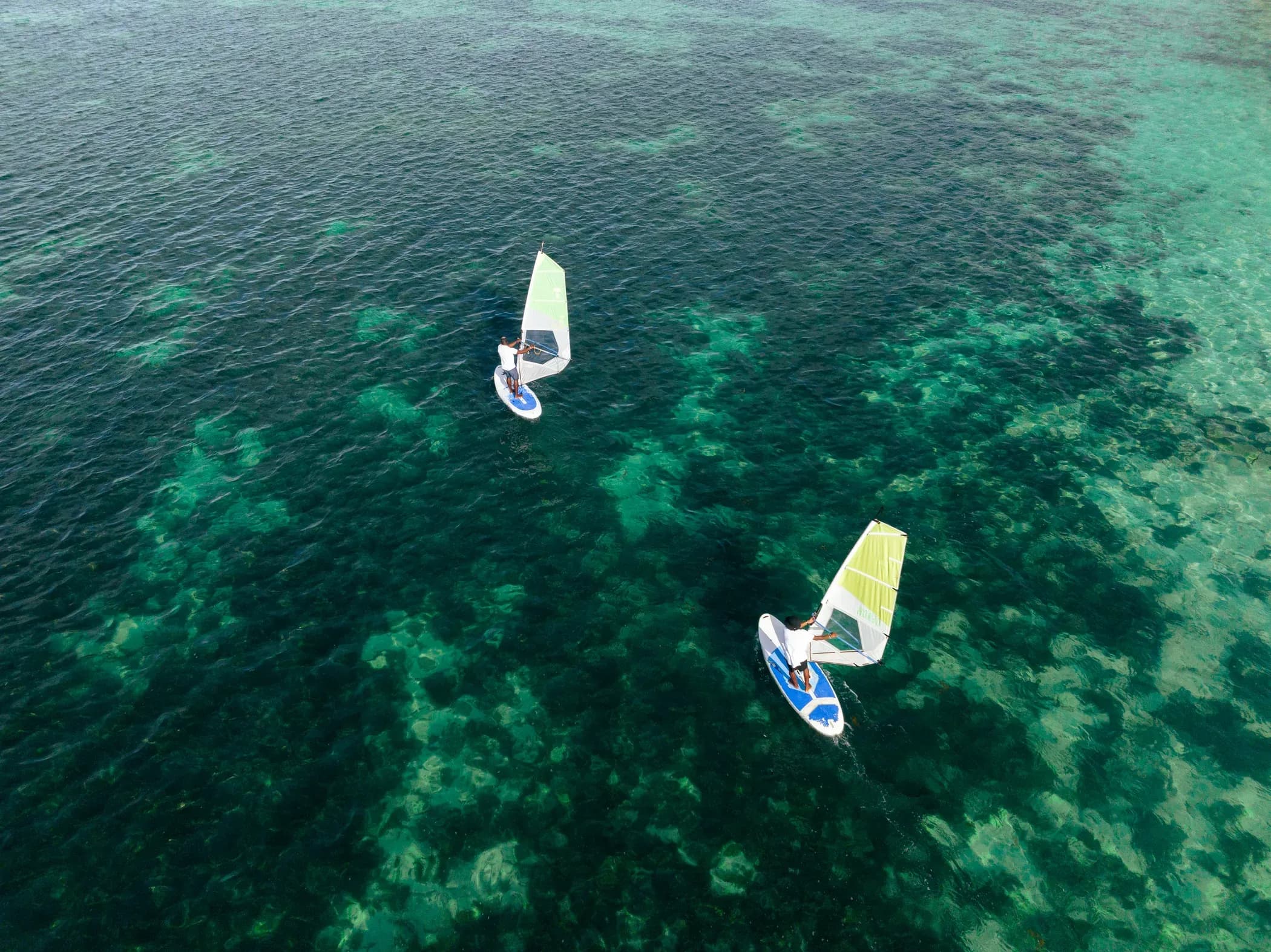 Windsurfing on the lagoon in front of Long Beach, A Sunlife Resort, Mauritius