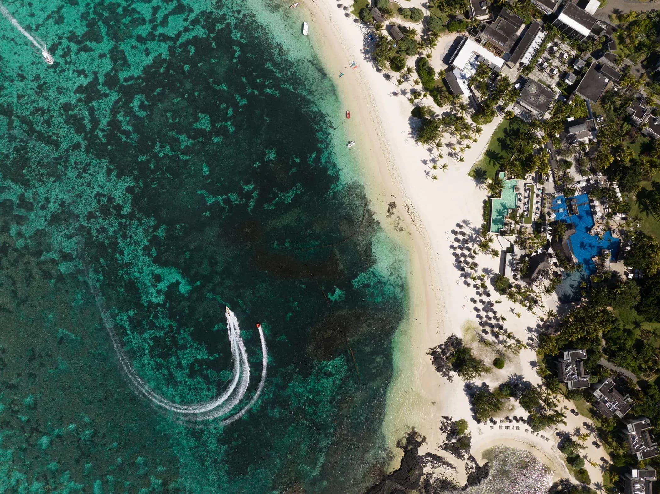 Aerial view of Long Beach, A Sunlife Resort's beachfront and lagoon at Belle Mare, Mauritius