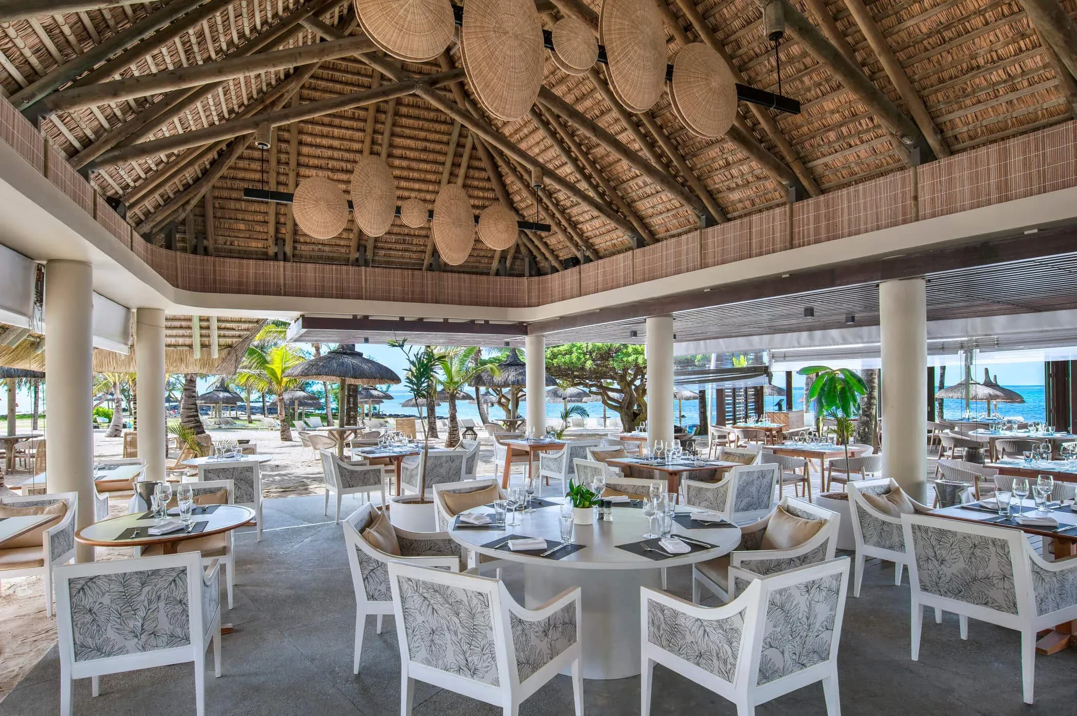 Tides restaurant dining beside the beach and pool at Long Beach, Mauritius