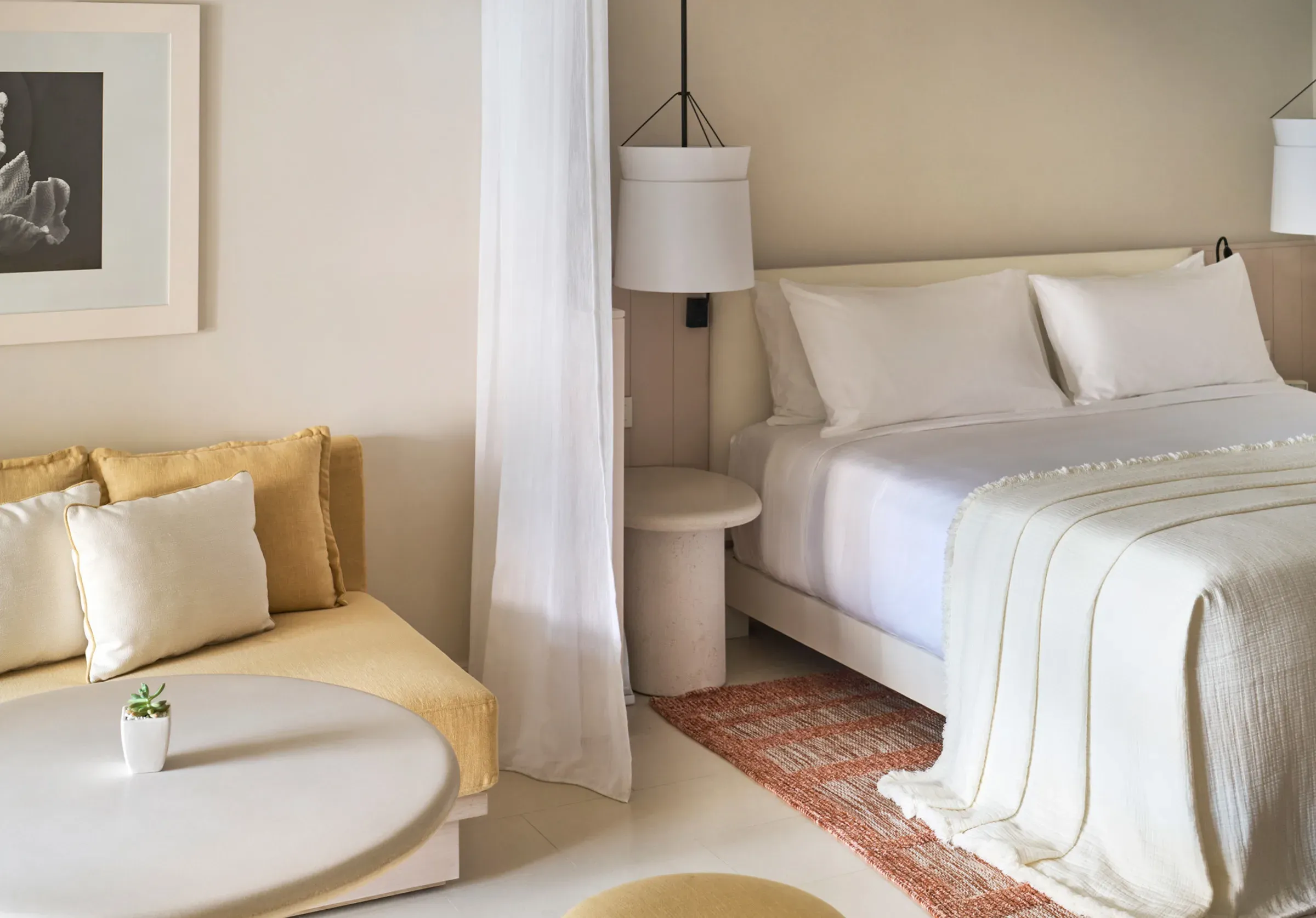 Pool View Junior Suite interior at LUX* Belle Mare